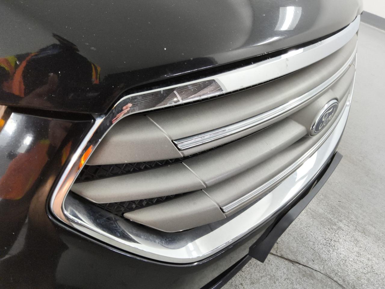 2017 Ford Taurus Sel Black vin: 1FAHP2H82HG126292 Damage: Grille, Chipped, 2