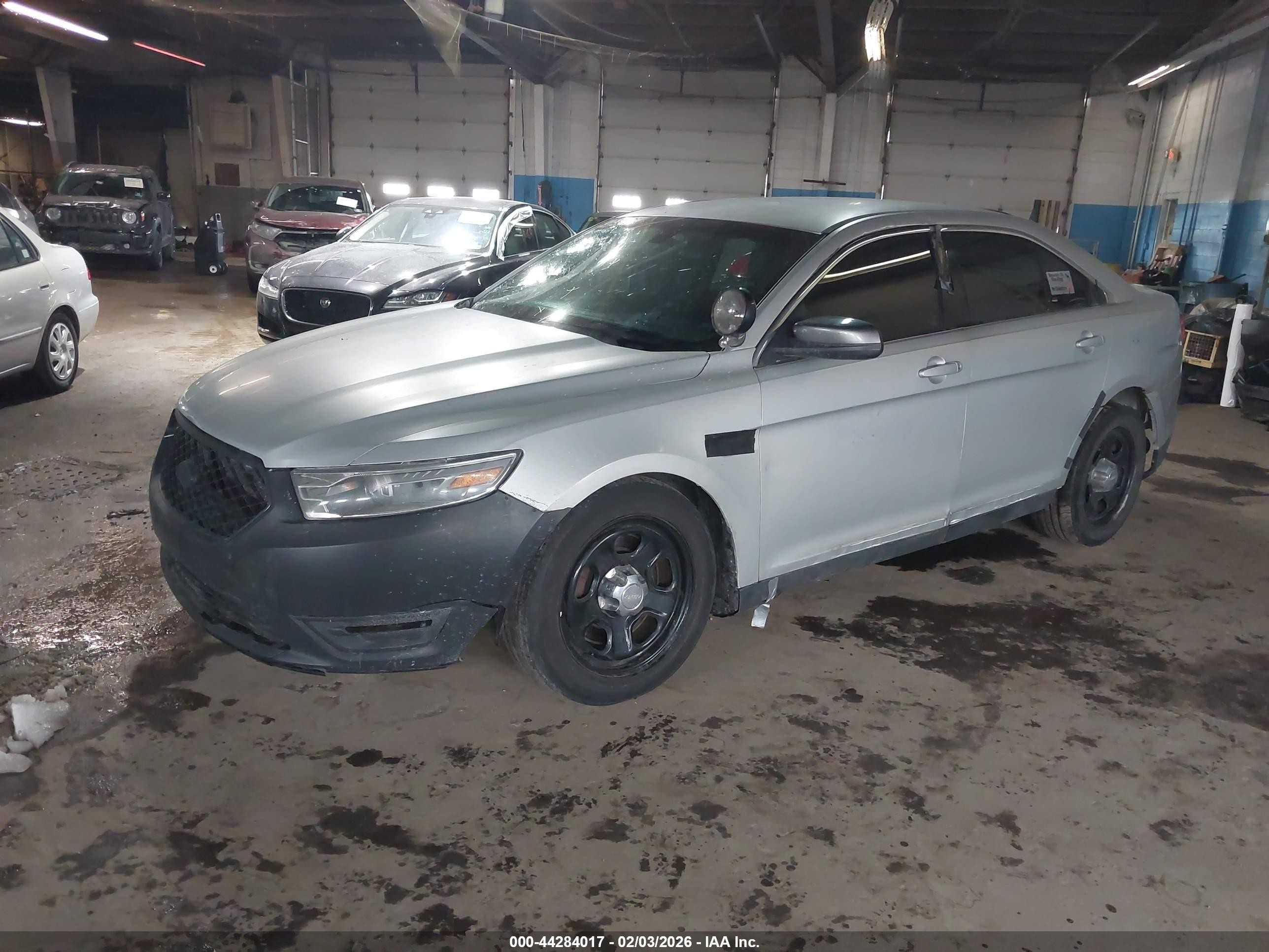 2014 Ford Police Interceptor   Silver vin: 1FAHP2MK4EG124119