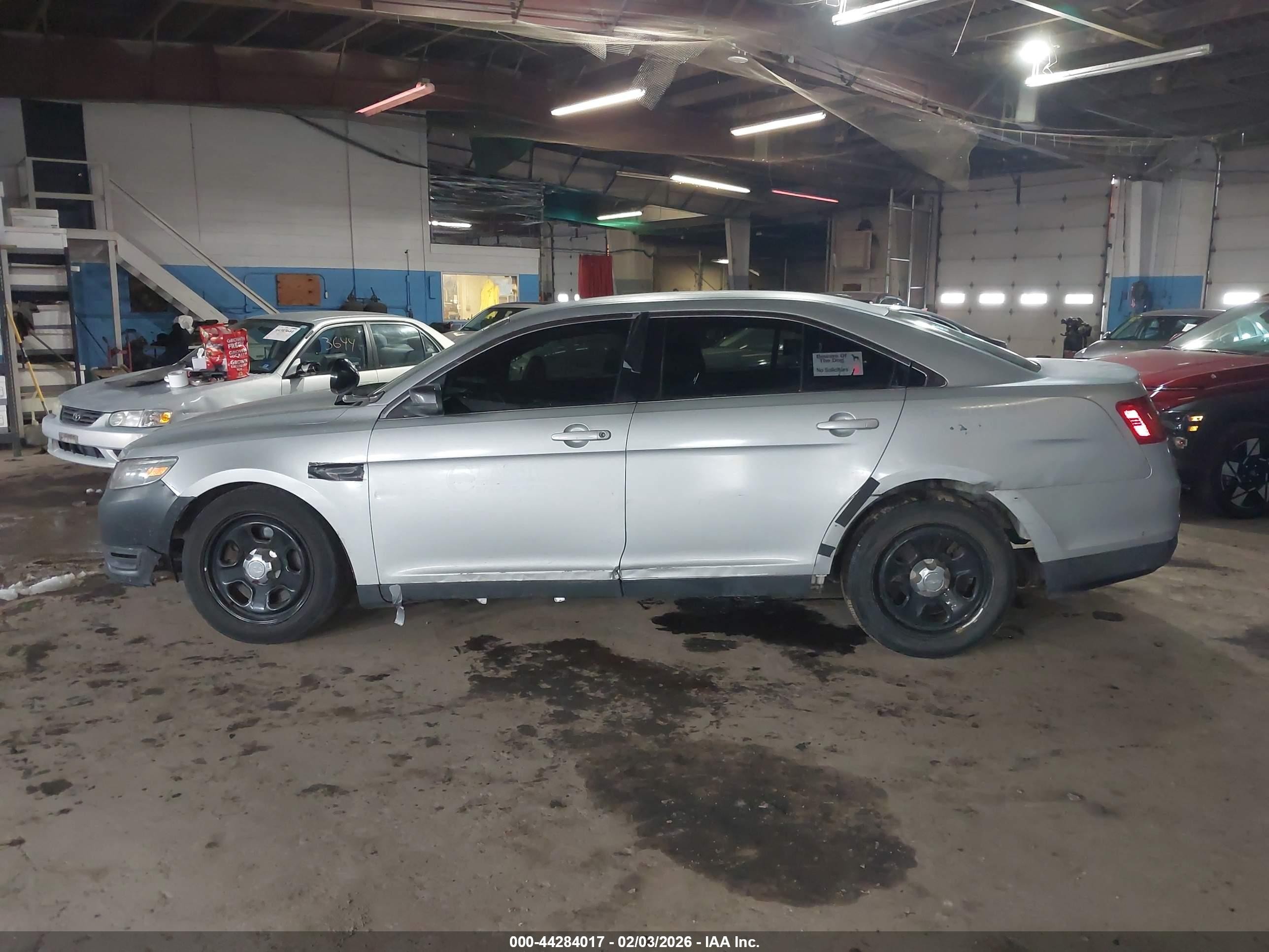 2014 Ford Police Interceptor   Silver vin: 1FAHP2MK4EG124119