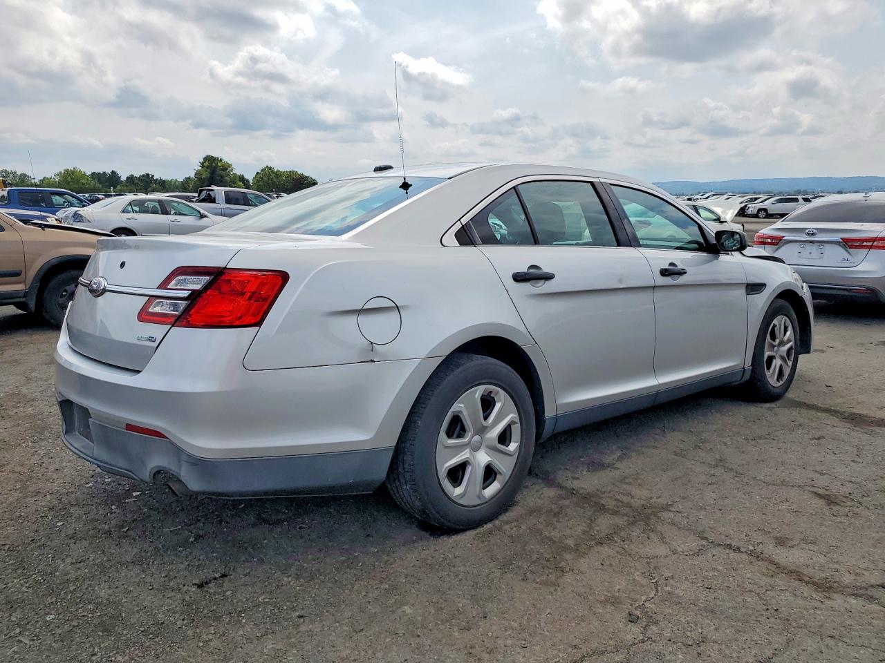 2014 Ford Taurus Police Interceptor Серебряный vin: 1FAHP2MK6EG119973