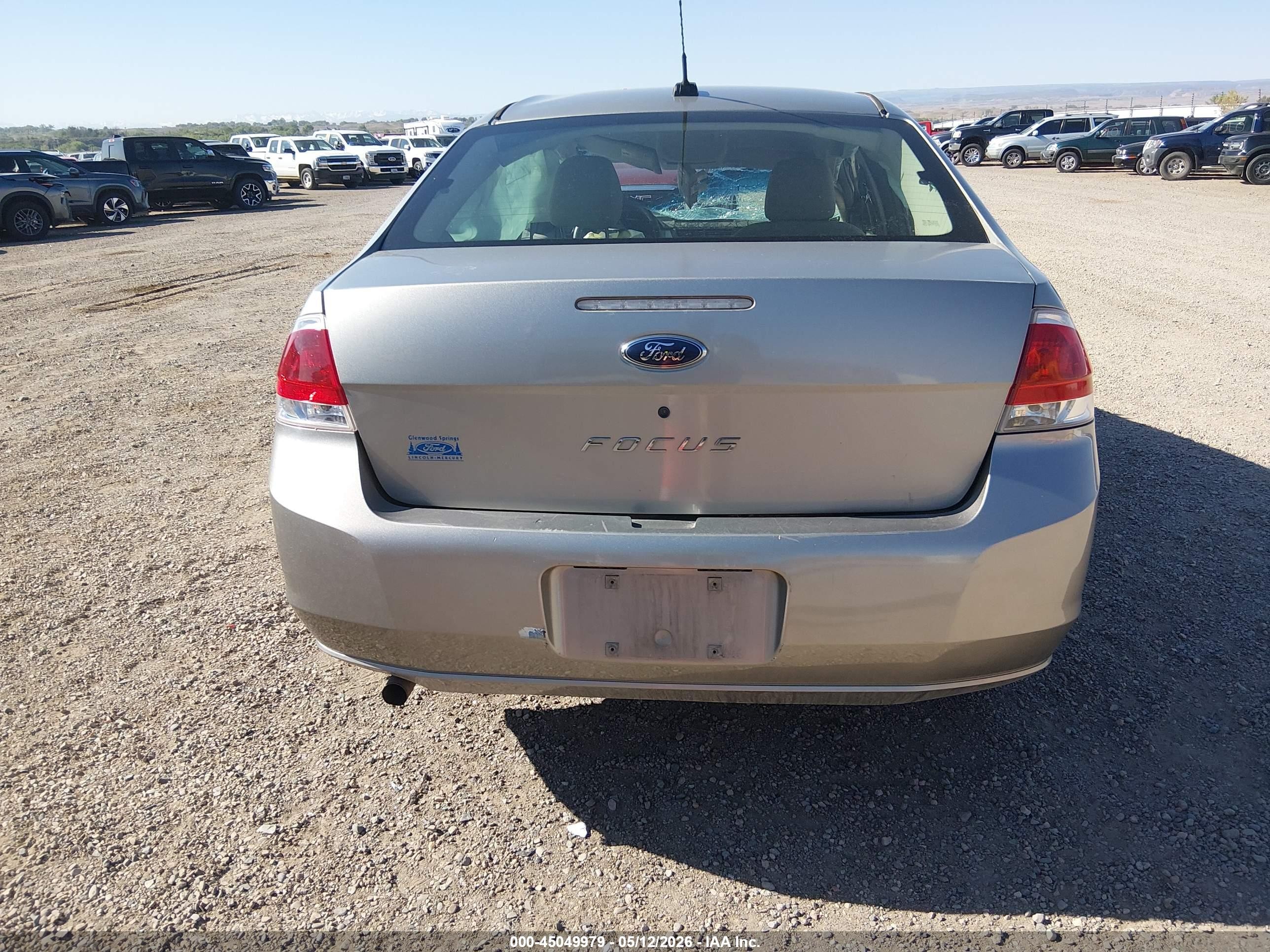 2008 Ford Focus S Tan vin: 1FAHP34N48W261605