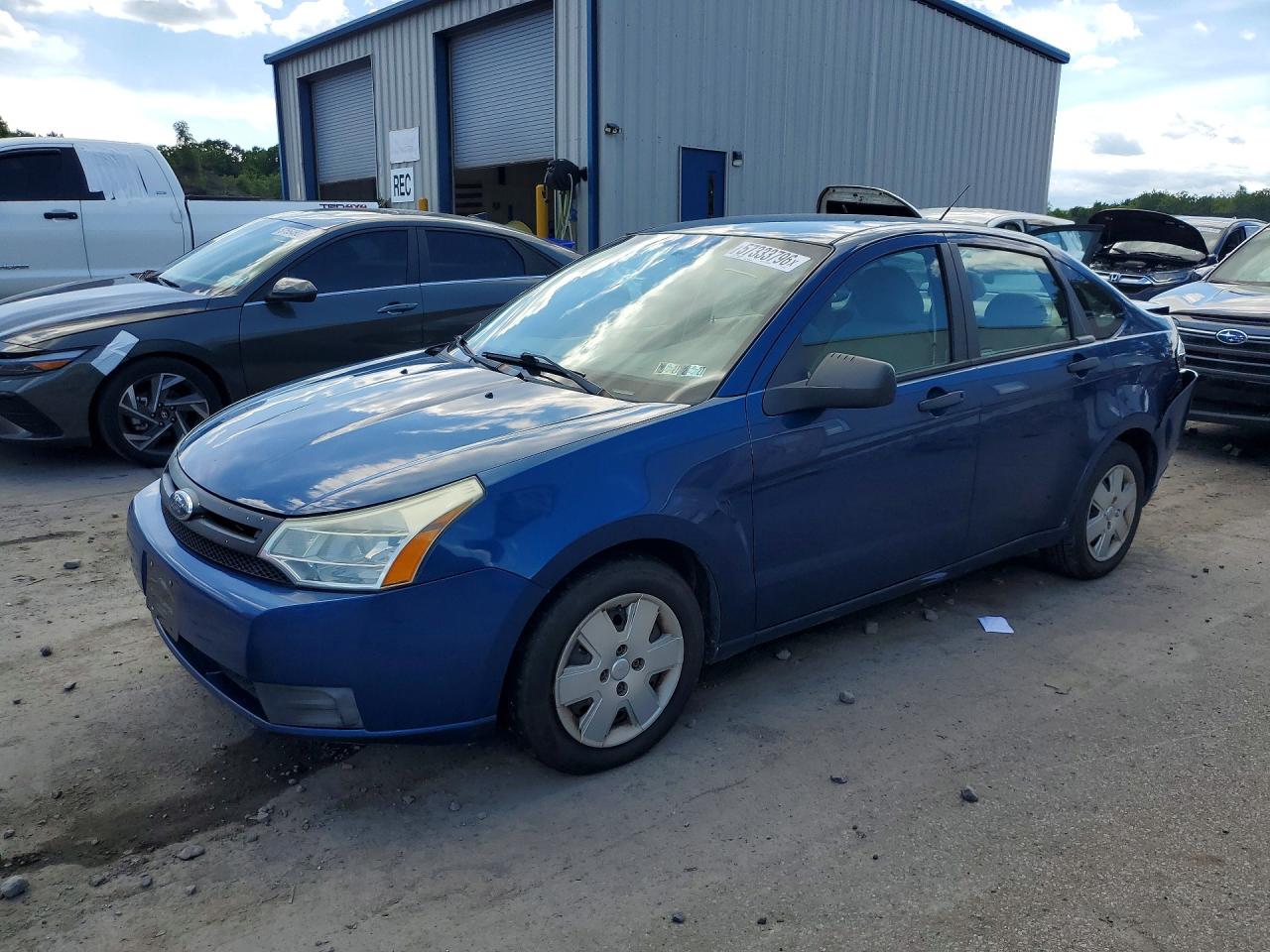 2009 Ford Focus S Blue vin: 1FAHP34N49W200823