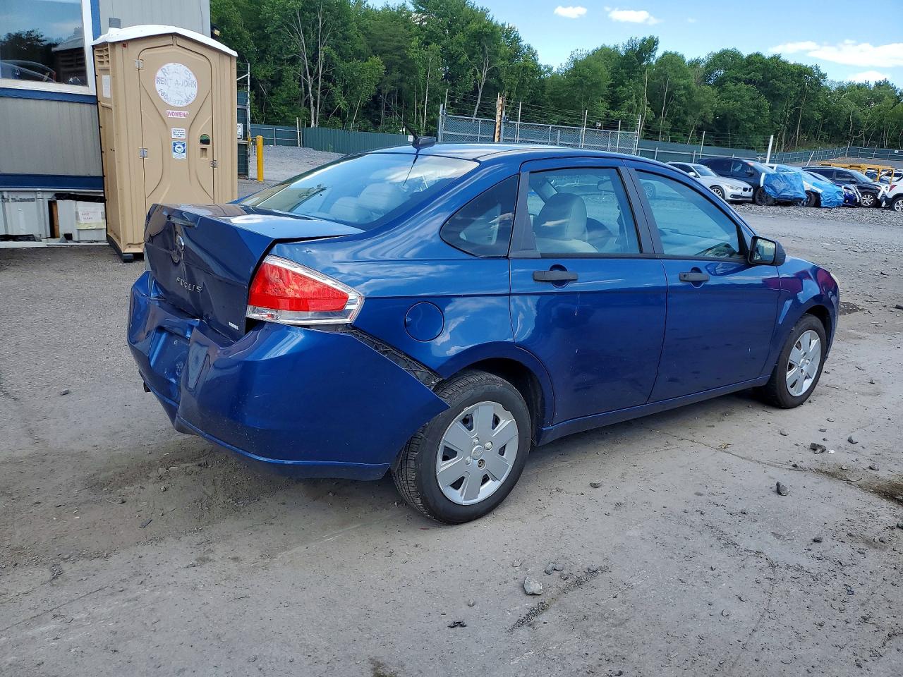 2009 Ford Focus S Blue vin: 1FAHP34N49W200823