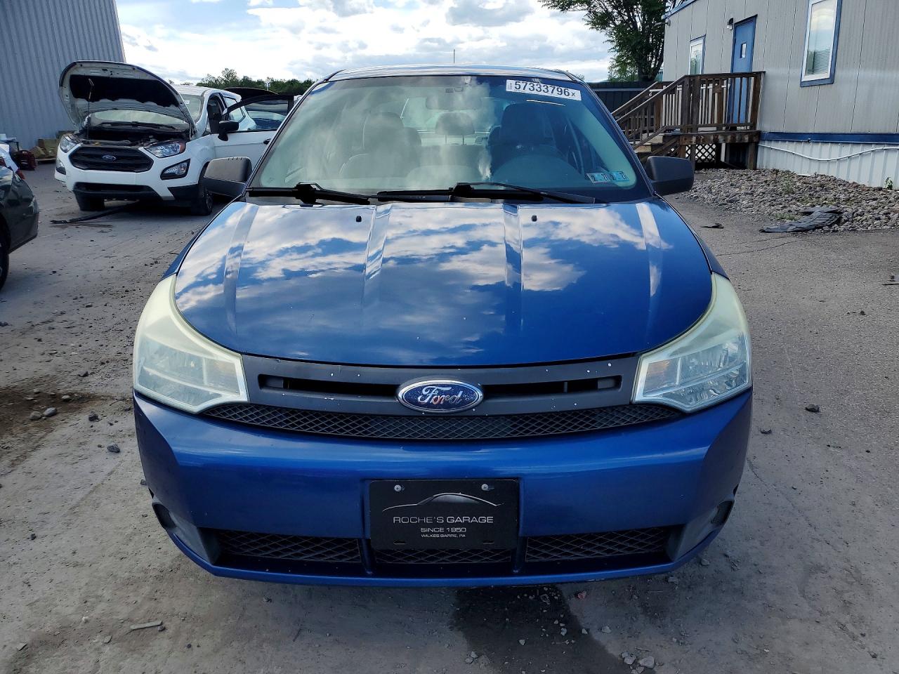 2009 Ford Focus S Blue vin: 1FAHP34N49W200823