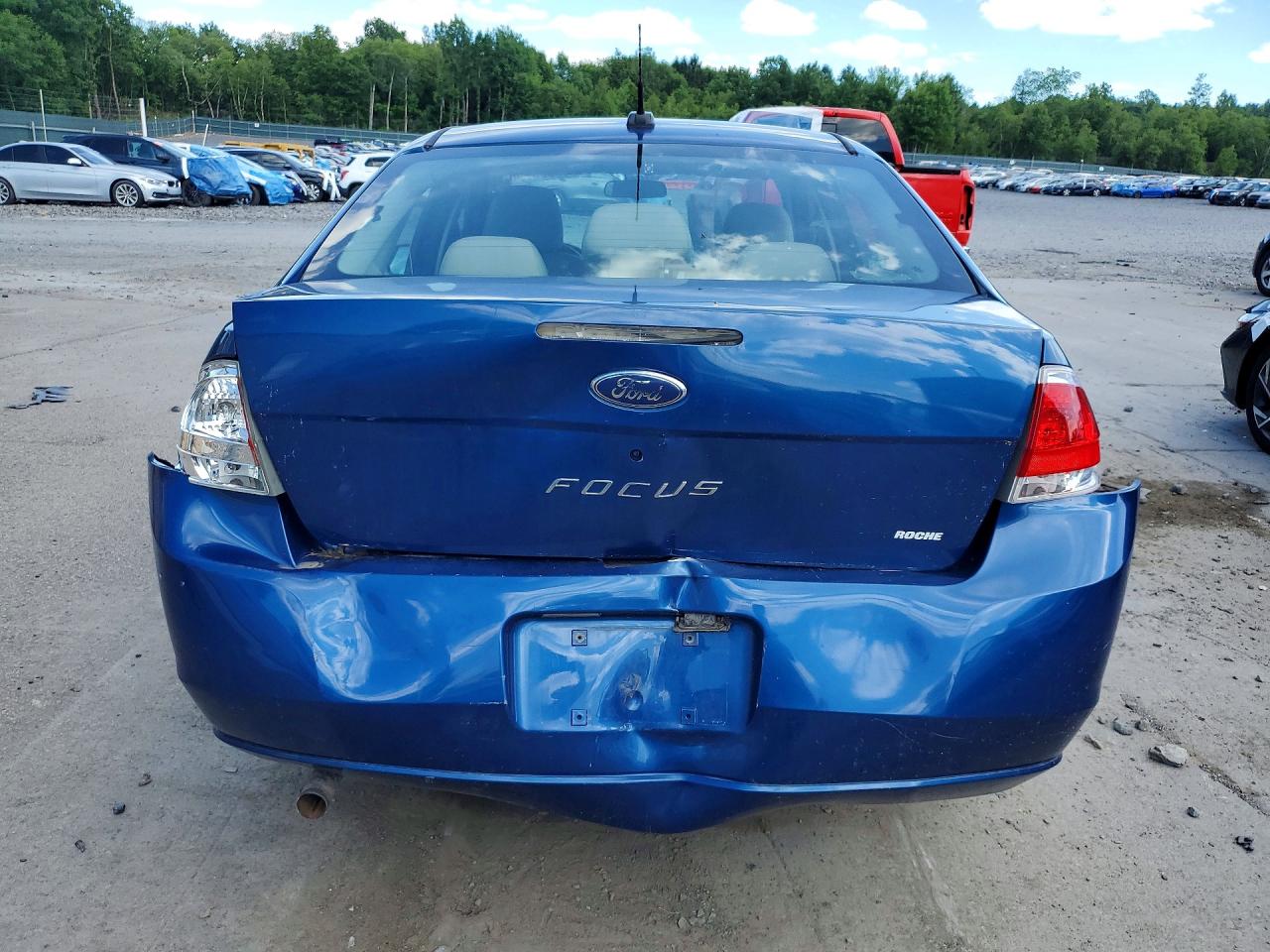 2009 Ford Focus S Blue vin: 1FAHP34N49W200823
