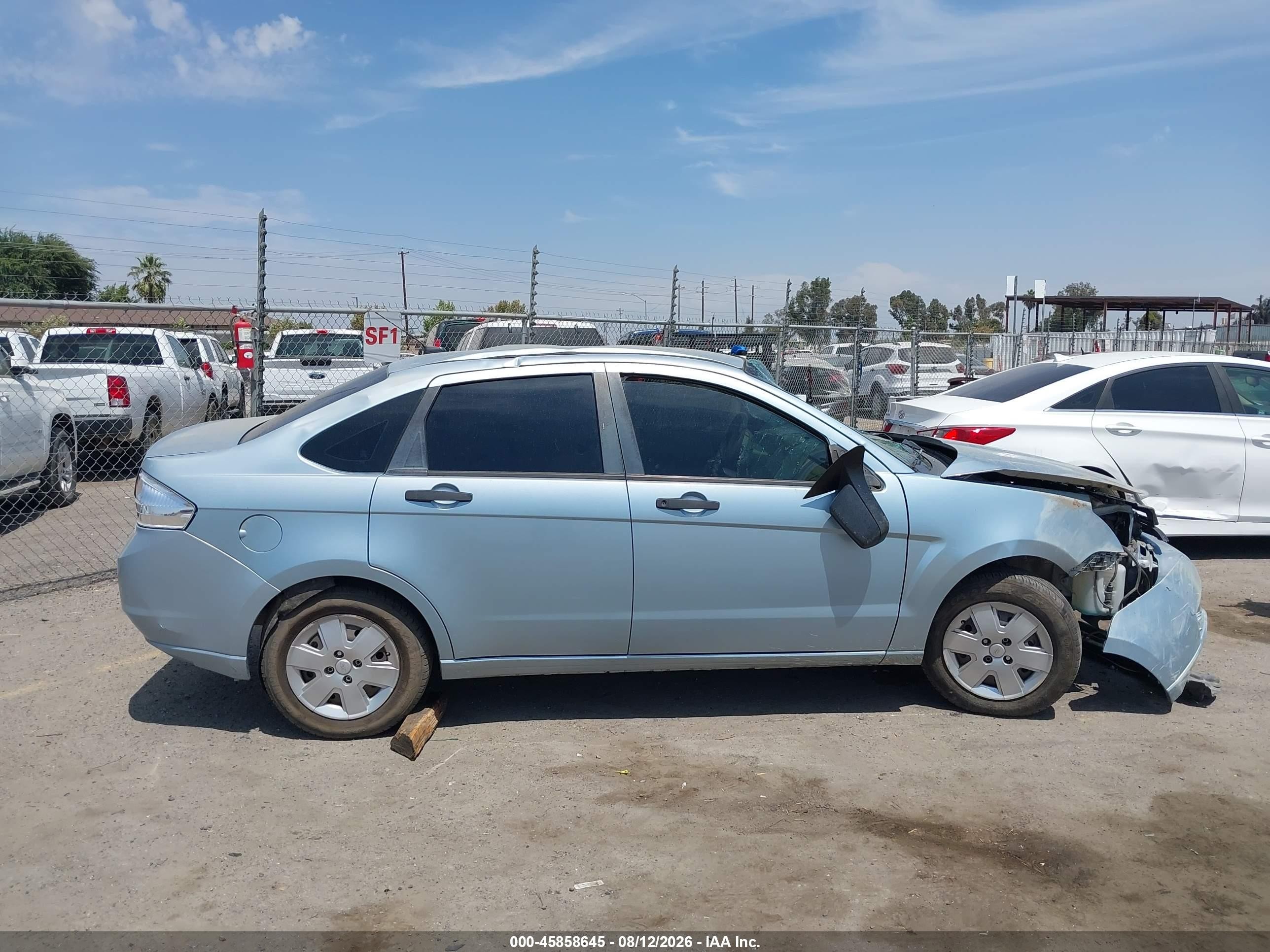 2009 Ford Focus S Light Blue vin: 1FAHP34N69W211404