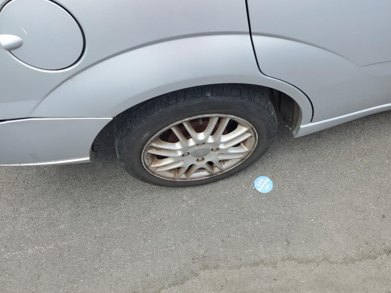 2006 Ford Focus Zx4 Silver vin: 1FAHP34N96W199681 Damage: Right Rear Wheel, Curb Rash, > 12 Inches
