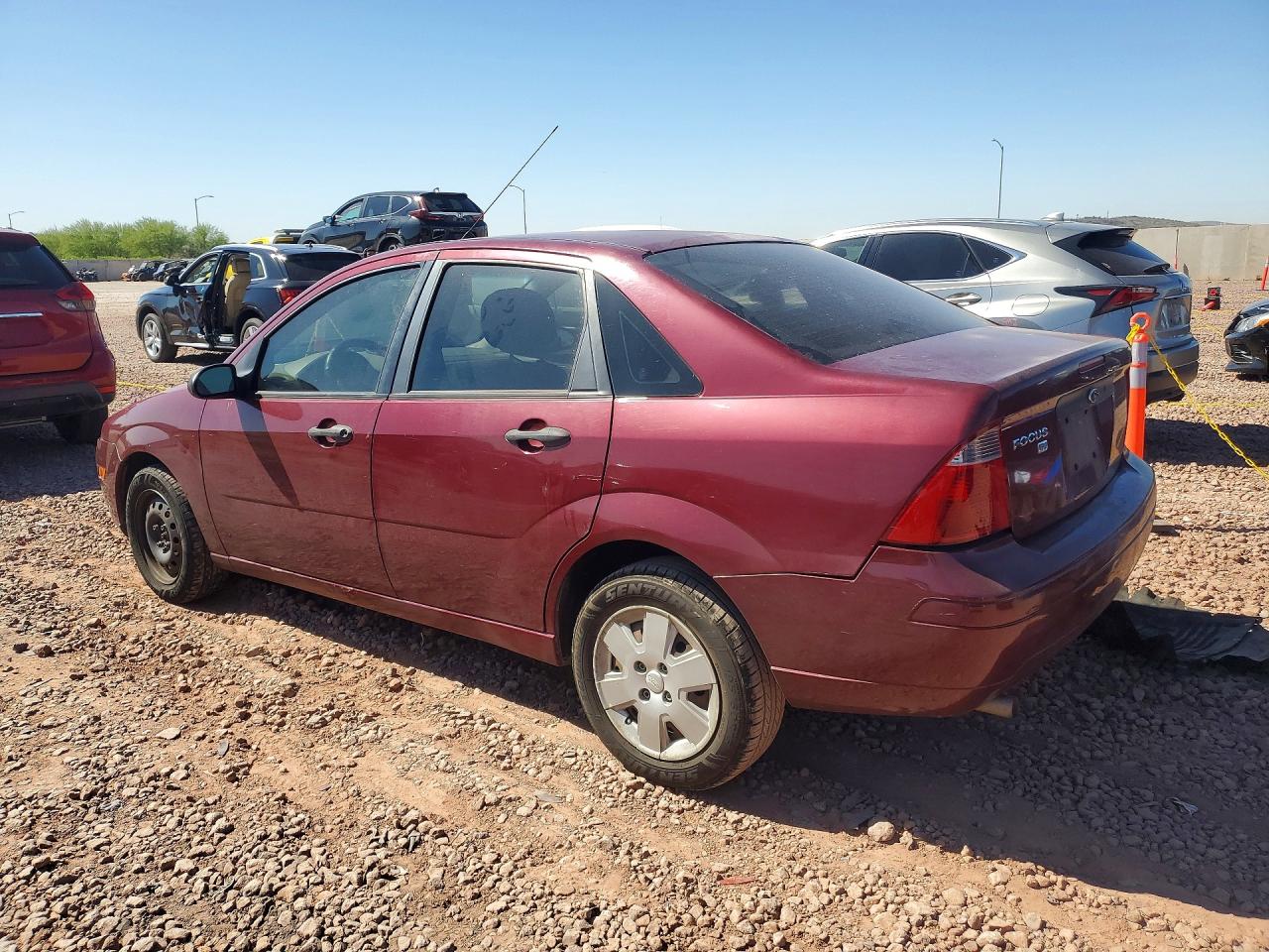 2007 Ford Focus Zx4/s/se/ses Burgundy vin: 1FAHP34N97W166472