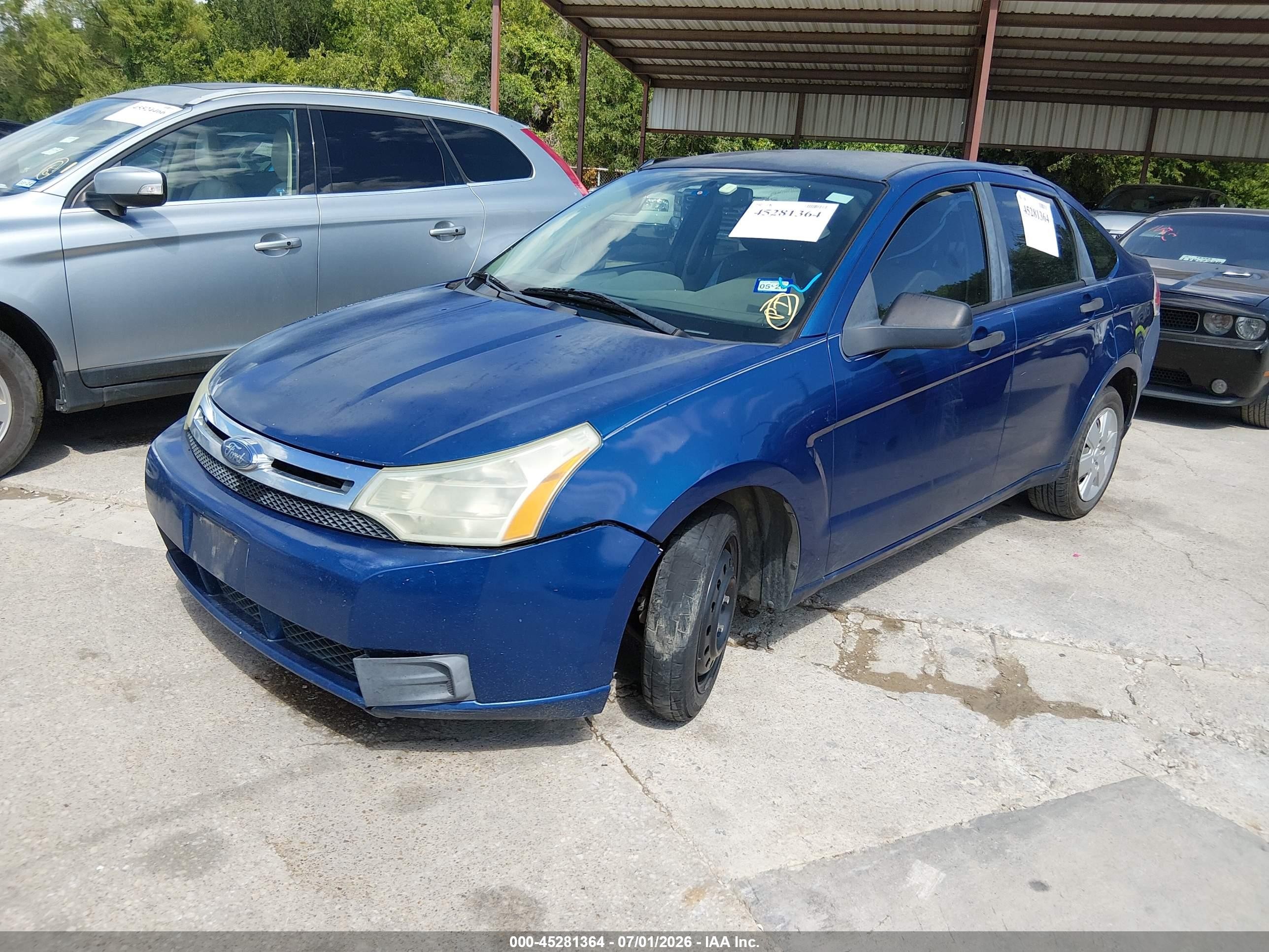 2009 Ford Focus S Blue vin: 1FAHP34N99W134897