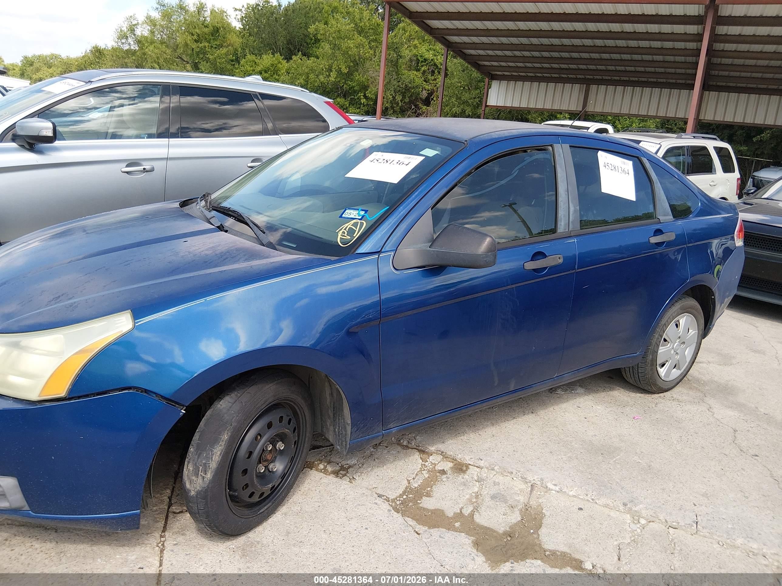 2009 Ford Focus S Blue vin: 1FAHP34N99W134897
