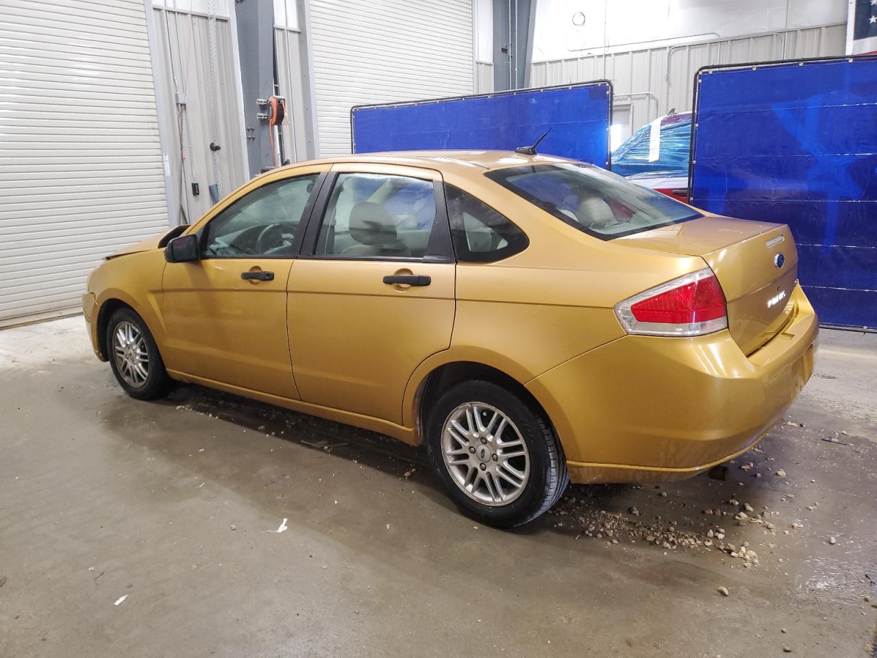 2009 Ford Focus Se Gold vin: 1FAHP35N09W165499