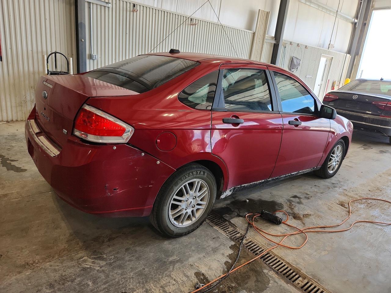 2009 Ford Focus Se Burgundy vin: 1FAHP35N09W207086