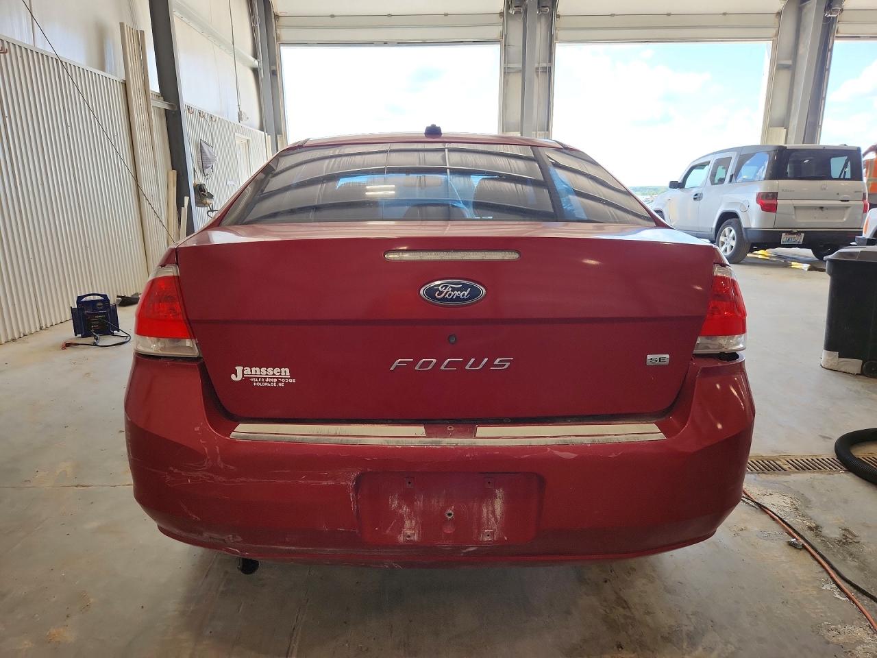 2009 Ford Focus Se Burgundy vin: 1FAHP35N09W207086