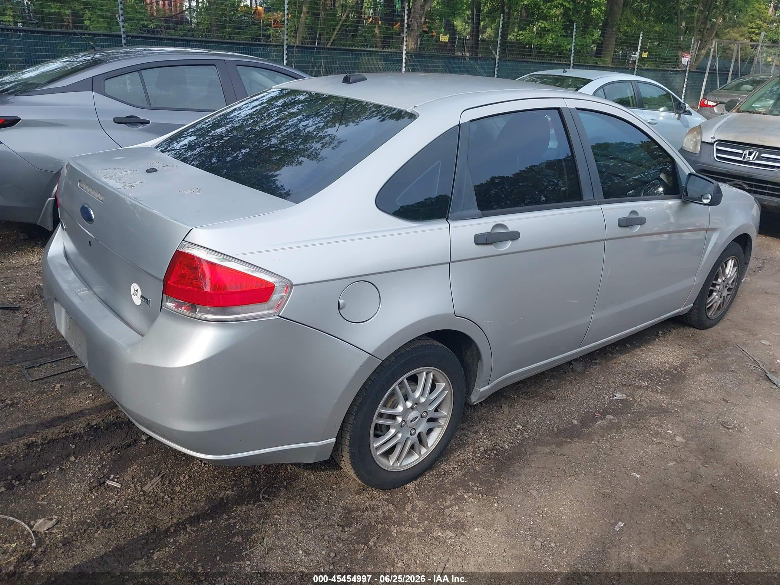 2009 Ford Focus Se Tan vin: 1FAHP35N39W110285