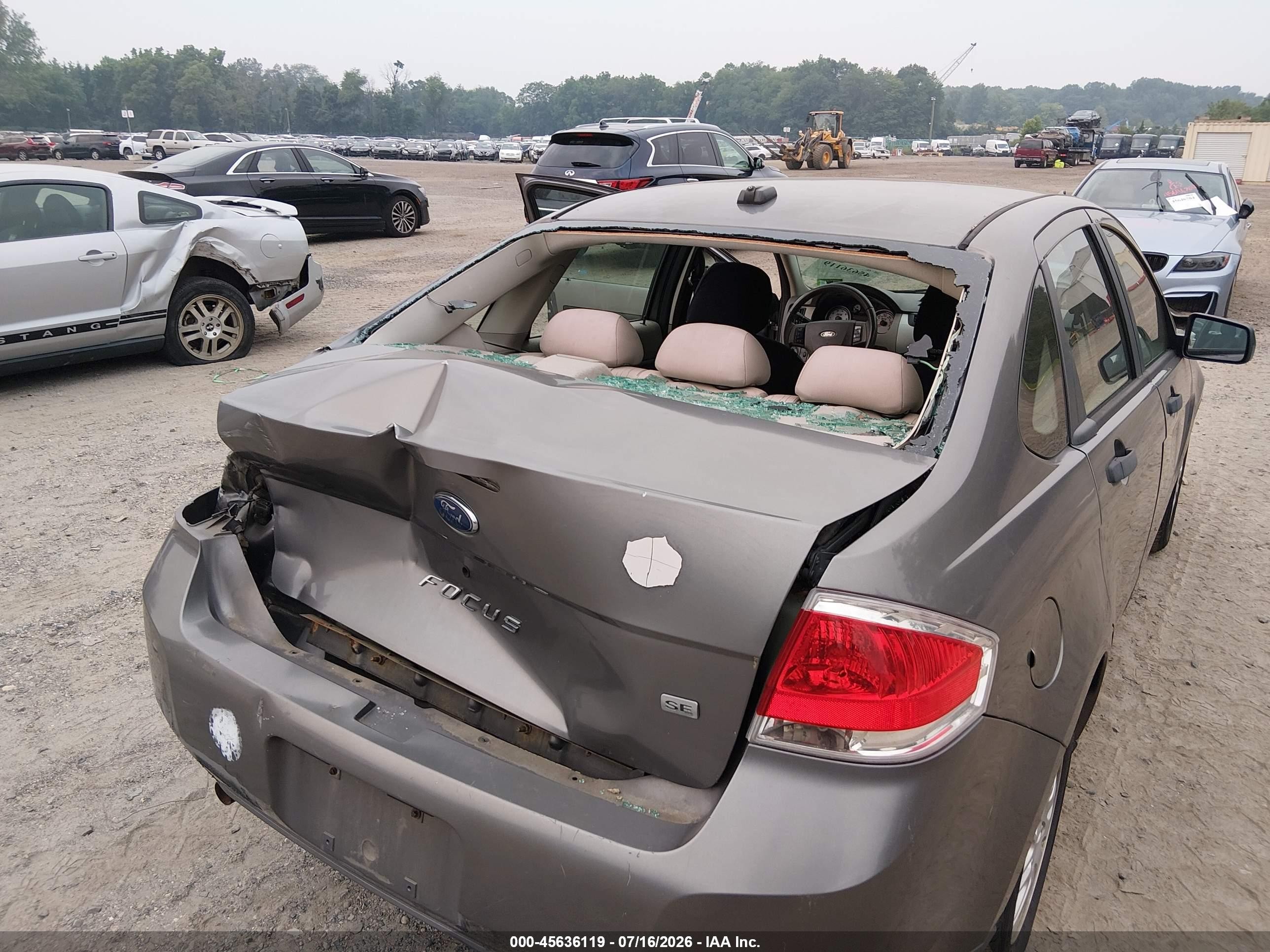 2009 Ford Focus Se Золотой vin: 1FAHP35N39W128446