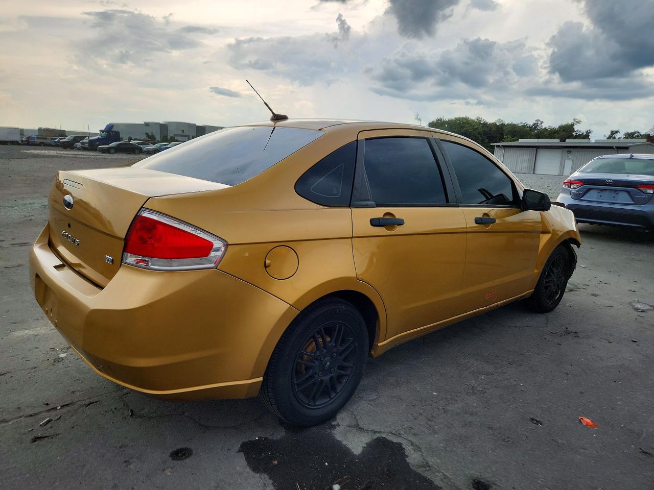 2009 Ford Focus Se Gold vin: 1FAHP35N39W205865