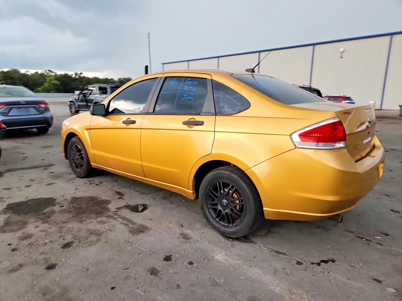 2009 Ford Focus Se Gold vin: 1FAHP35N39W205865
