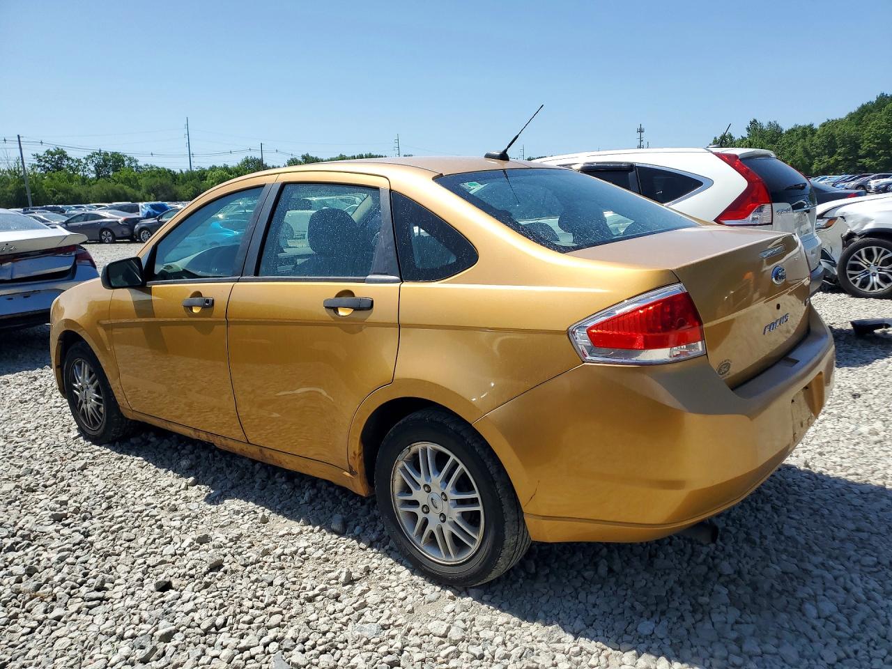 2009 Ford Focus Se Gold vin: 1FAHP35N49W229382