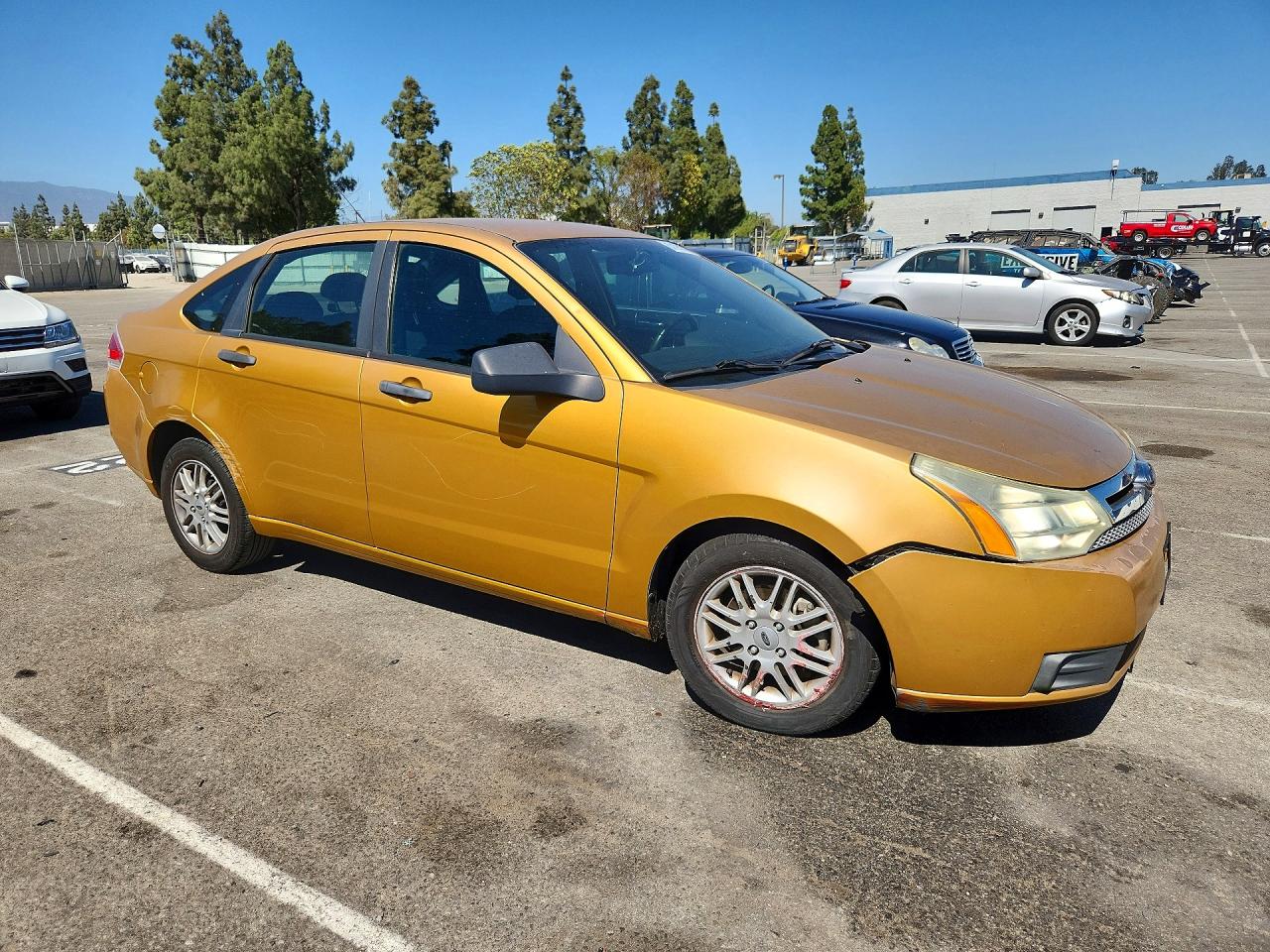2009 Ford Focus Se Gold vin: 1FAHP35N79W259573