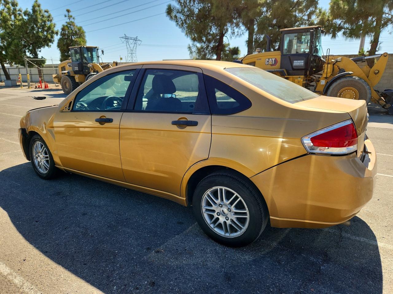 2009 Ford Focus Se Gold vin: 1FAHP35N79W259573