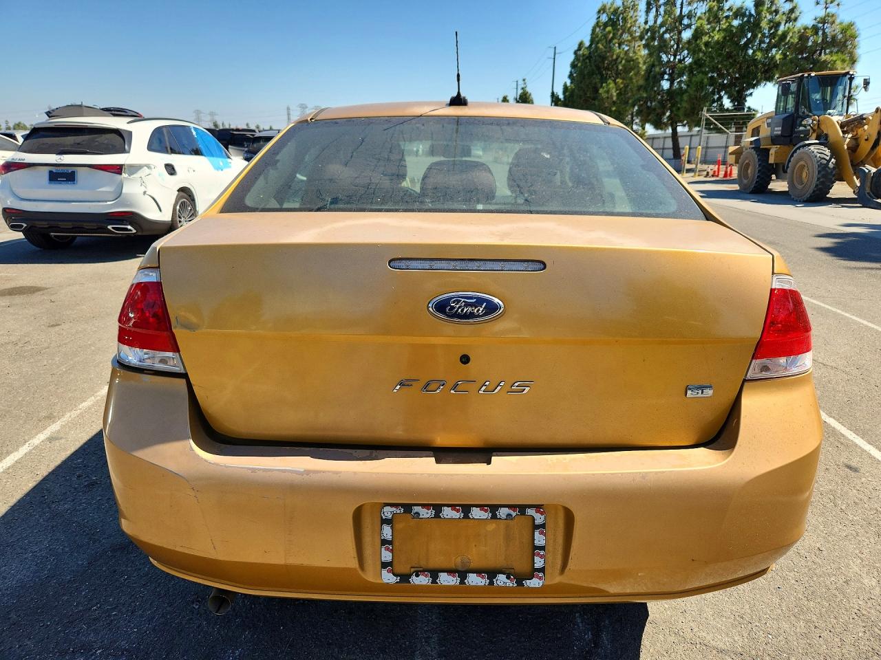 2009 Ford Focus Se Gold vin: 1FAHP35N79W259573