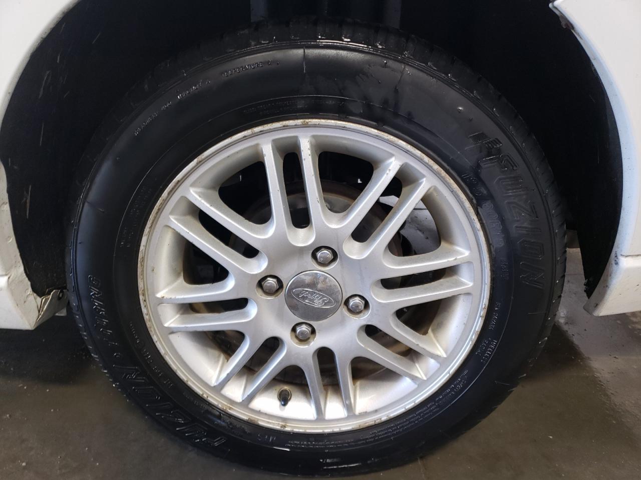 2008 Ford Focus Se White vin: 1FAHP35N98W182641 Damage: Left Rear Wheel, Curb Rash, > 12 Inches