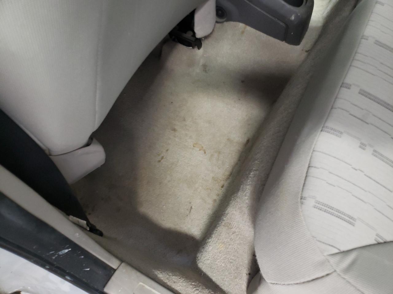 2008 Ford Focus Se White vin: 1FAHP35N98W182641 Damage: Left Rear Carpet, Stained, Permanent