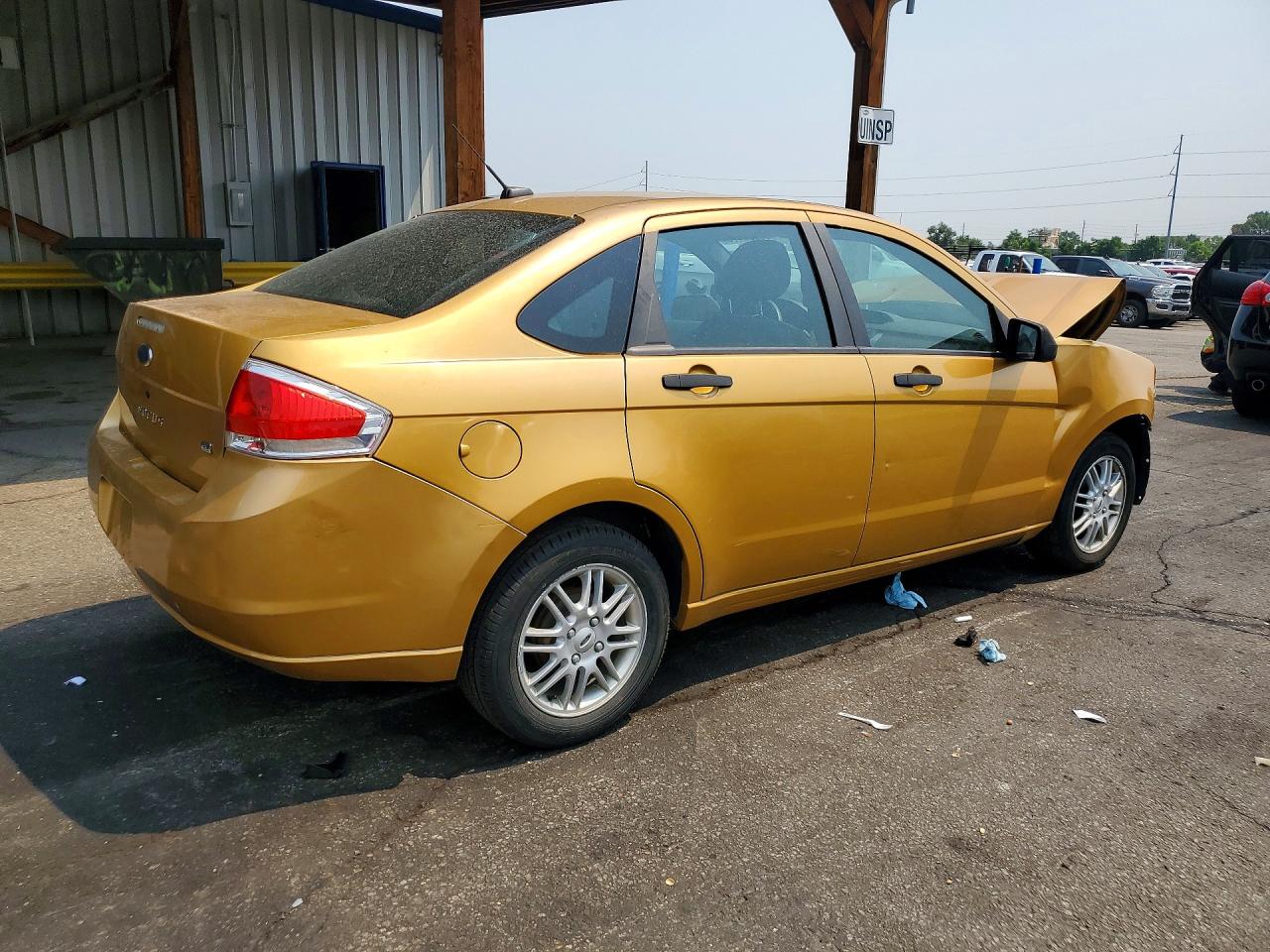 2009 Ford Focus Se Gold vin: 1FAHP35N99W231824
