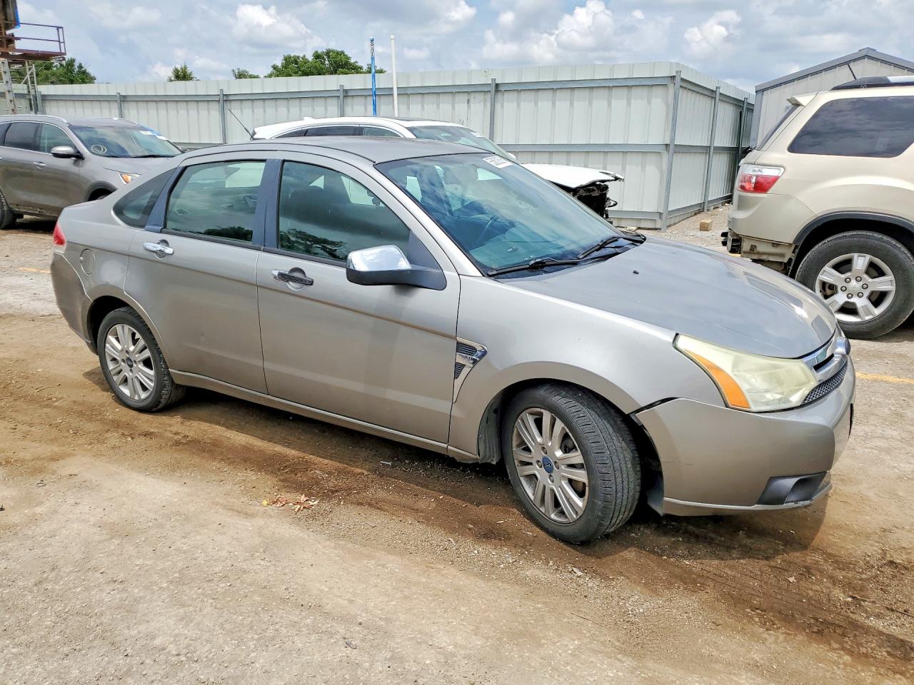 2008 Ford Focus Tan vin: 1FAHP35NX8W261476