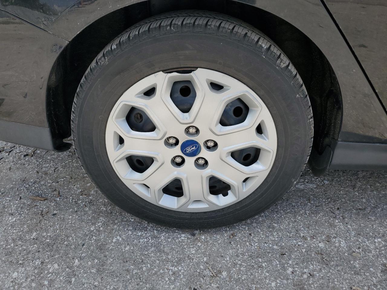 2012 Ford Focus Se Black vin: 1FAHP3F24CL127870 Damage: Right Rear Wheel Cover, Broken, Replacement Required