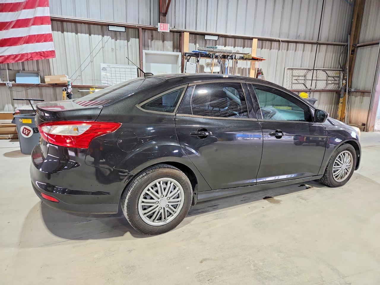 2012 Ford Focus Black vin: 1FAHP3F29CL304297