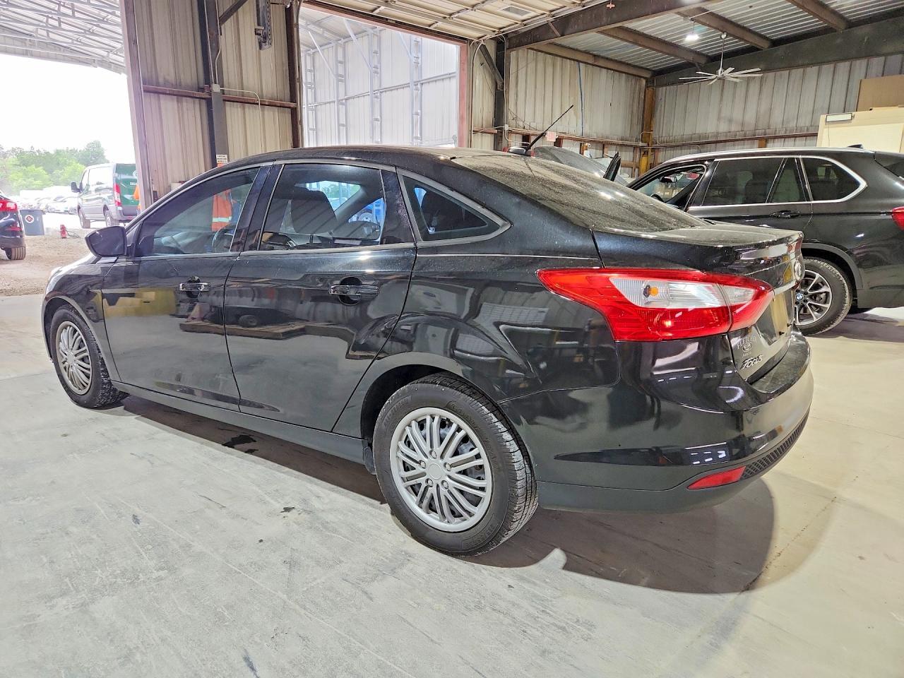 2012 Ford Focus Black vin: 1FAHP3F29CL304297