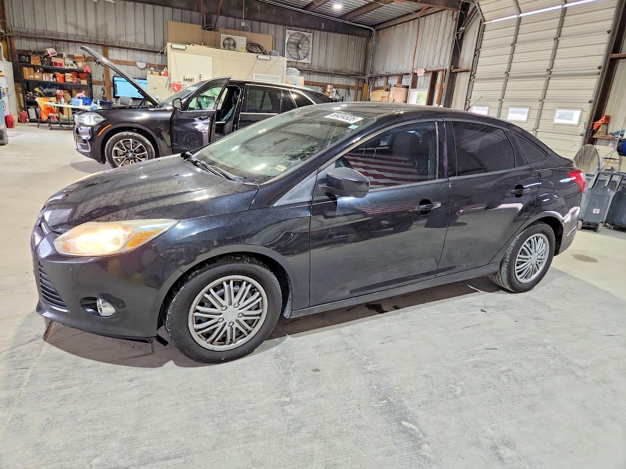 2012 Ford Focus Black vin: 1FAHP3F29CL304297