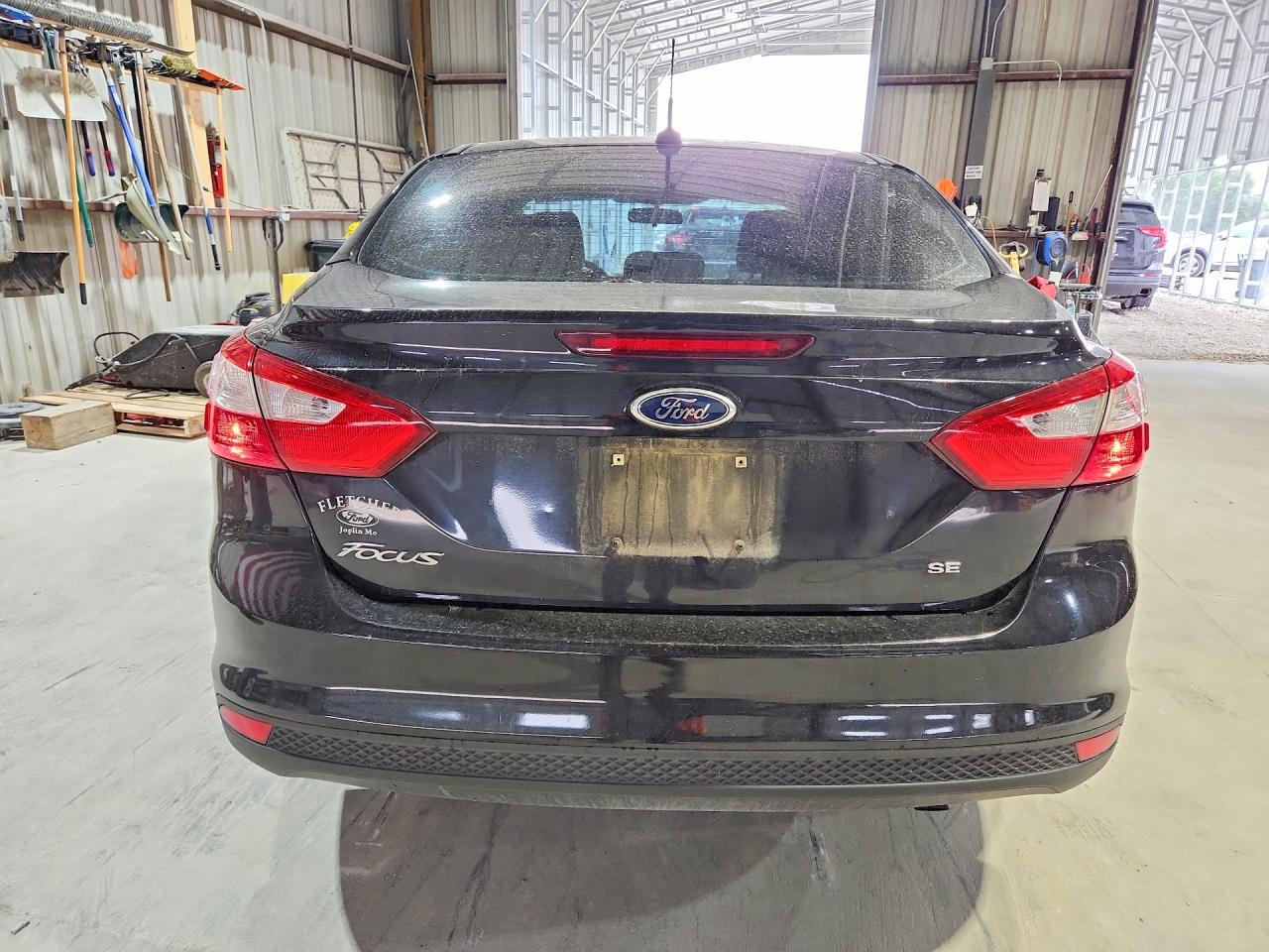 2012 Ford Focus Black vin: 1FAHP3F29CL304297