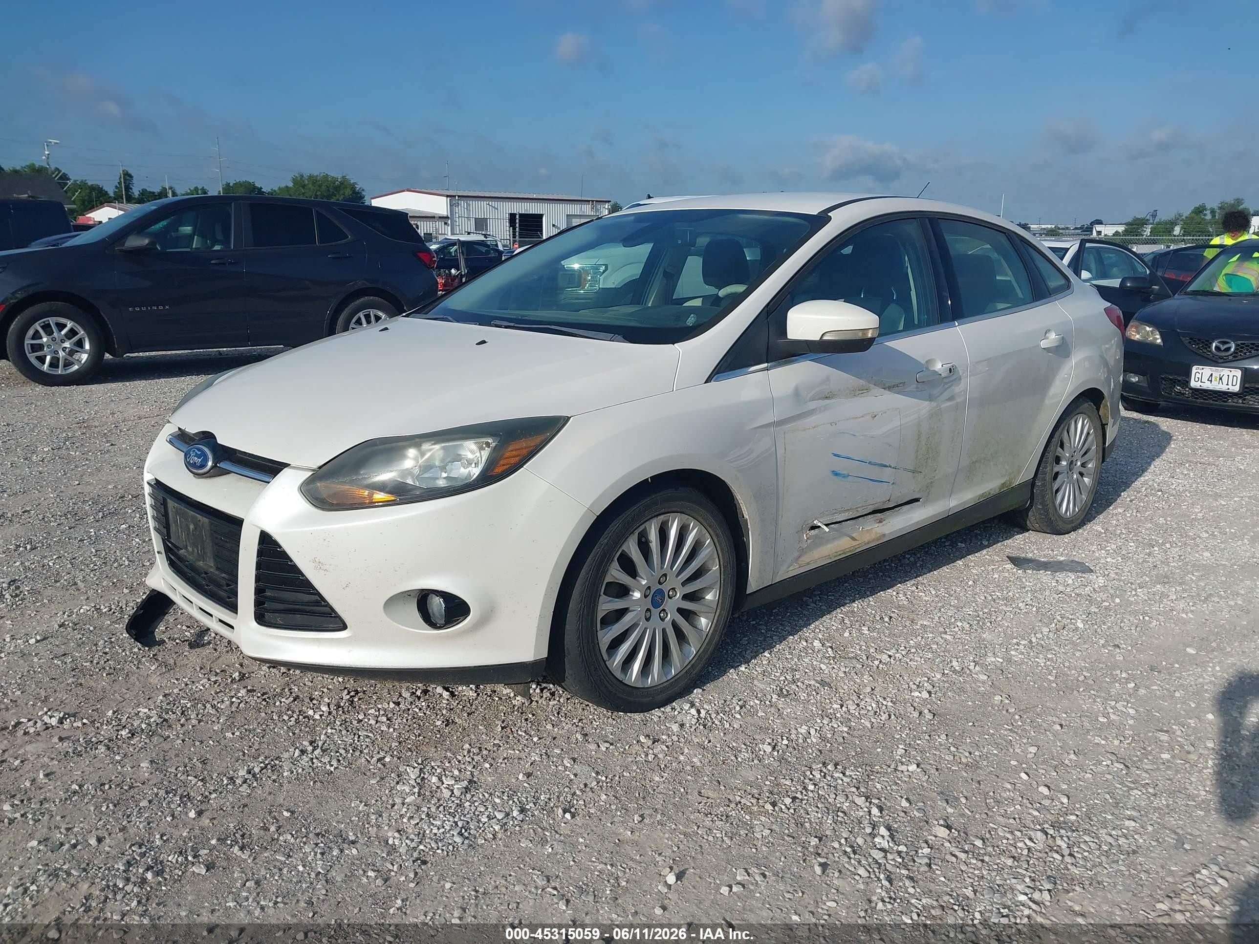 2012 Ford Focus Titanium White vin: 1FAHP3J20CL104917