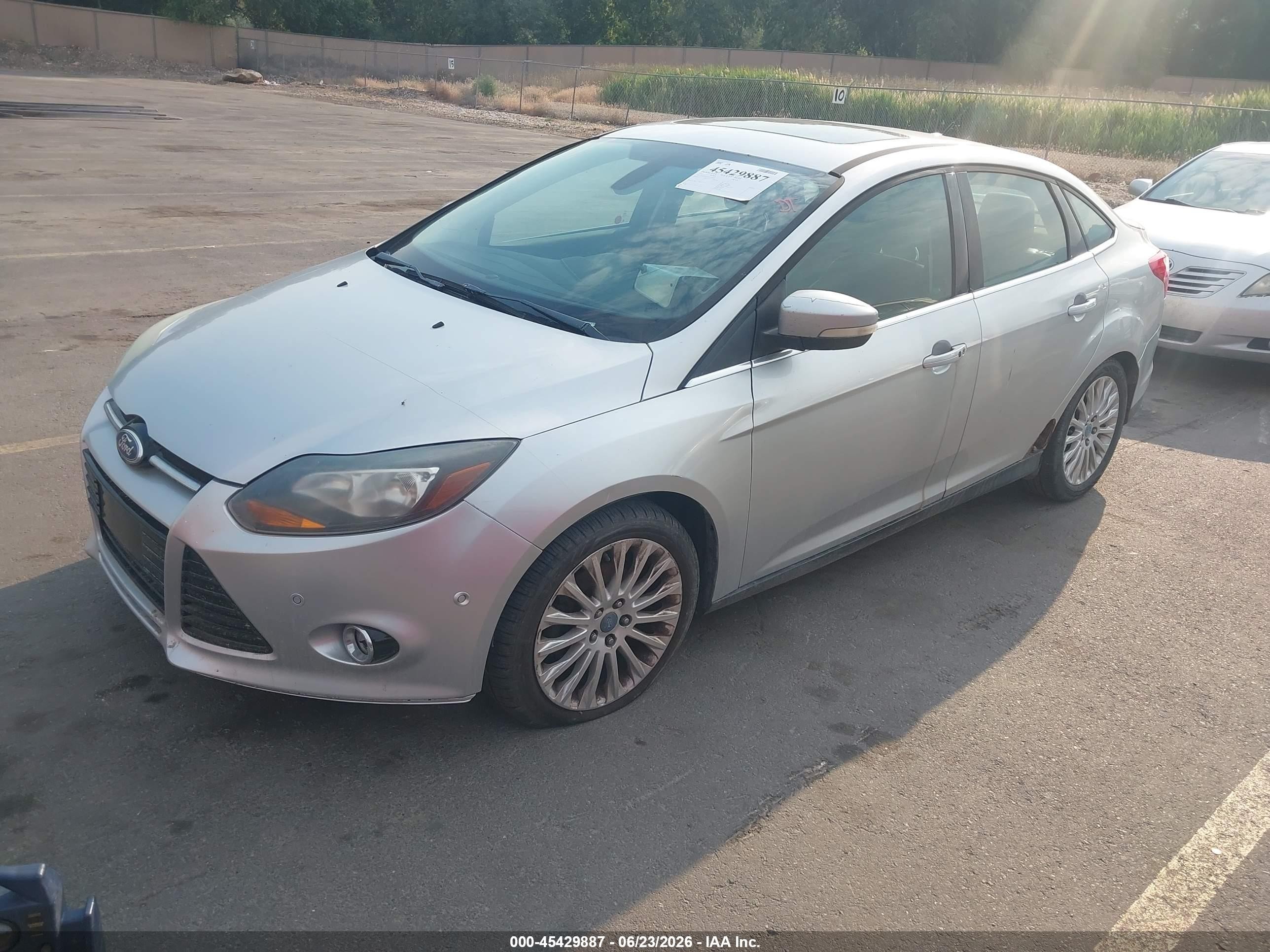 2012 Ford Focus Titanium Silver vin: 1FAHP3J21CL133049