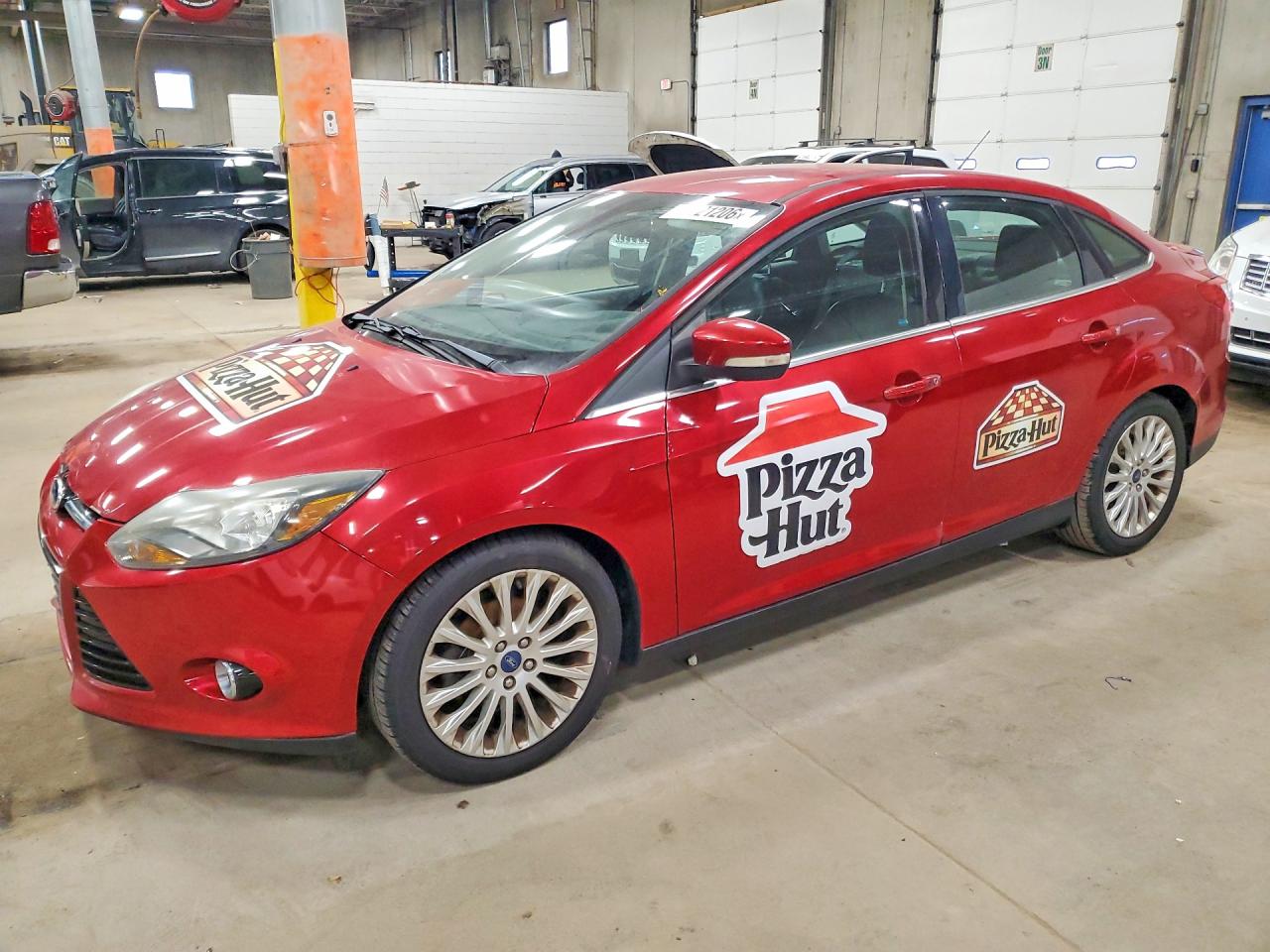 2012 Ford Focus Titanium Red vin: 1FAHP3J21CL145430