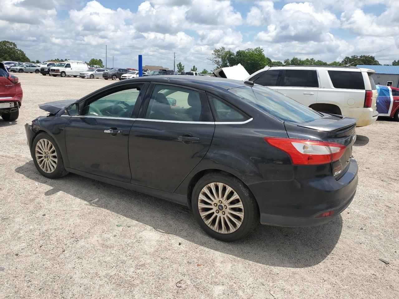 2012 Ford Focus Titanium Black vin: 1FAHP3J24CL407778