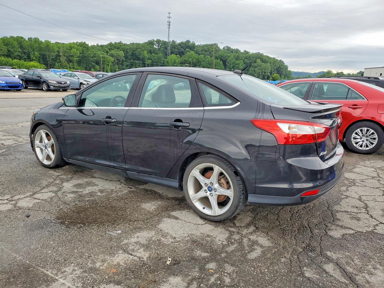 2012 Ford Focus Titanium Black vin: 1FAHP3J25CL447934
