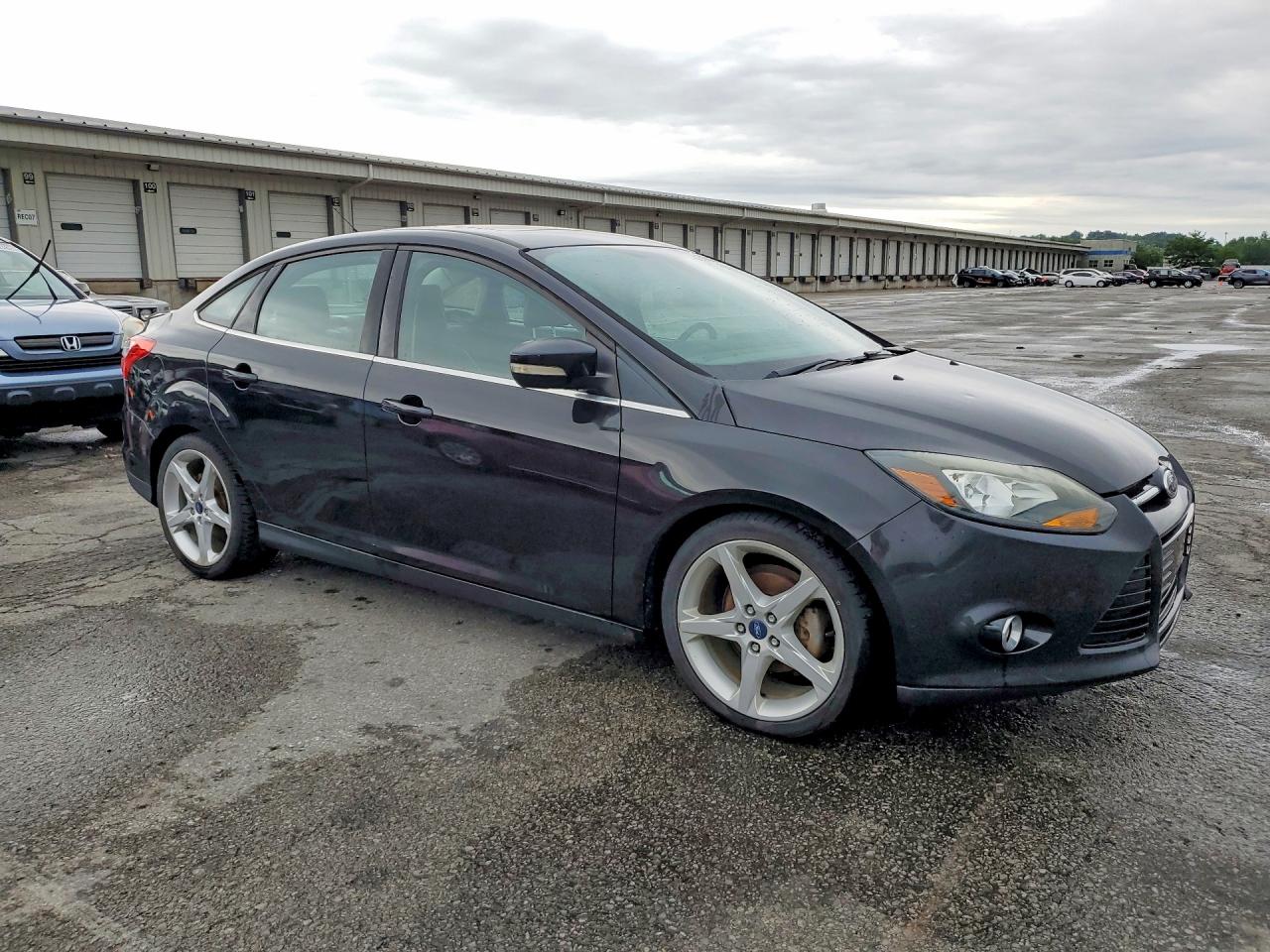 2012 Ford Focus Titanium Black vin: 1FAHP3J25CL447934