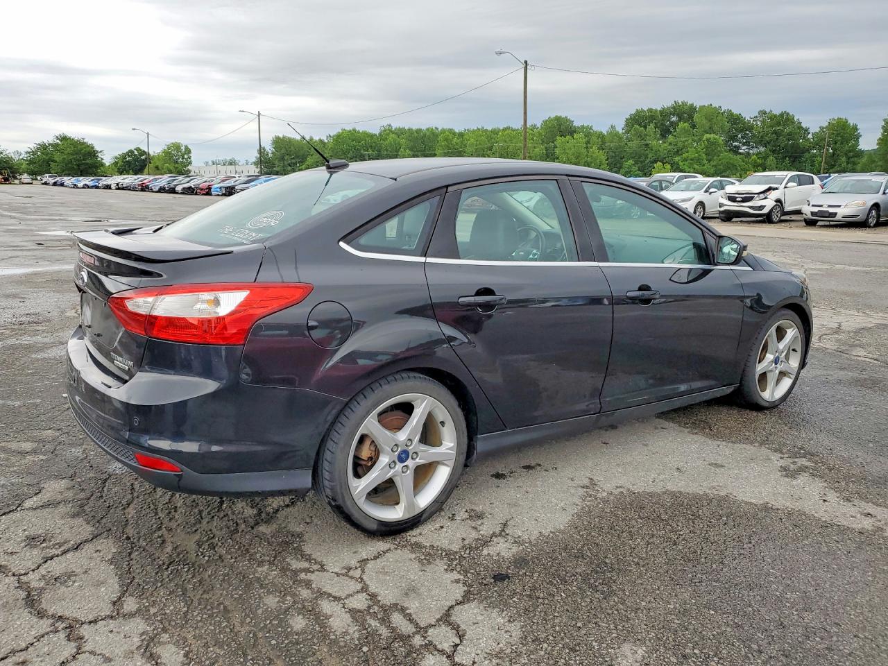 2012 Ford Focus Titanium Black vin: 1FAHP3J25CL447934
