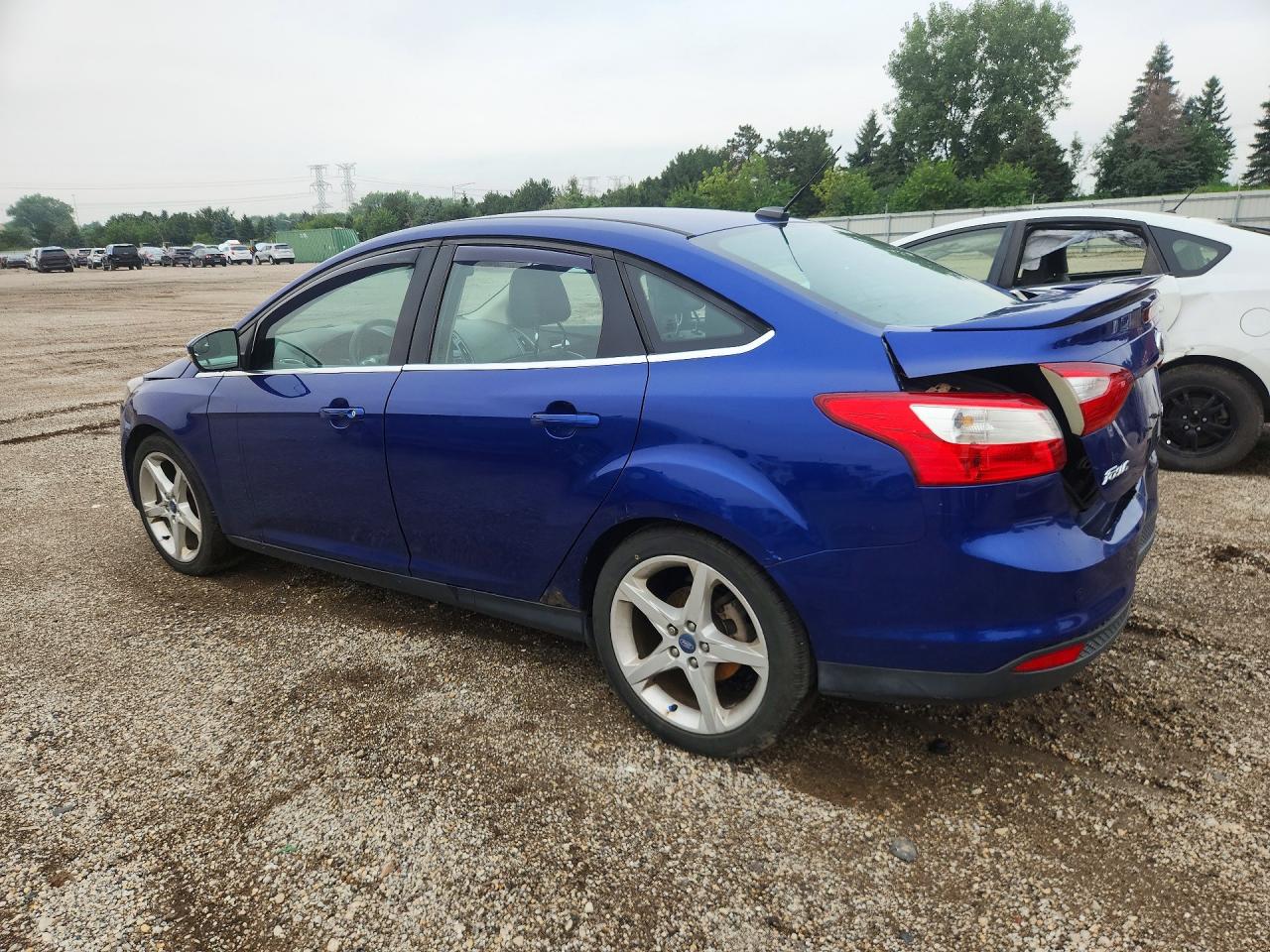 2012 Ford Focus Titanium Blue vin: 1FAHP3J26CL303941