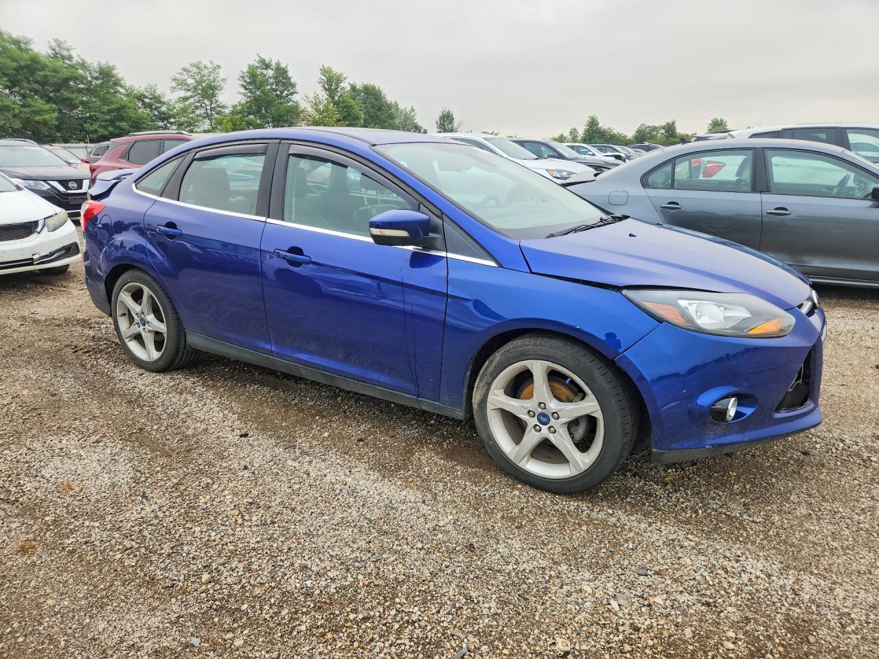 2012 Ford Focus Titanium Blue vin: 1FAHP3J26CL303941