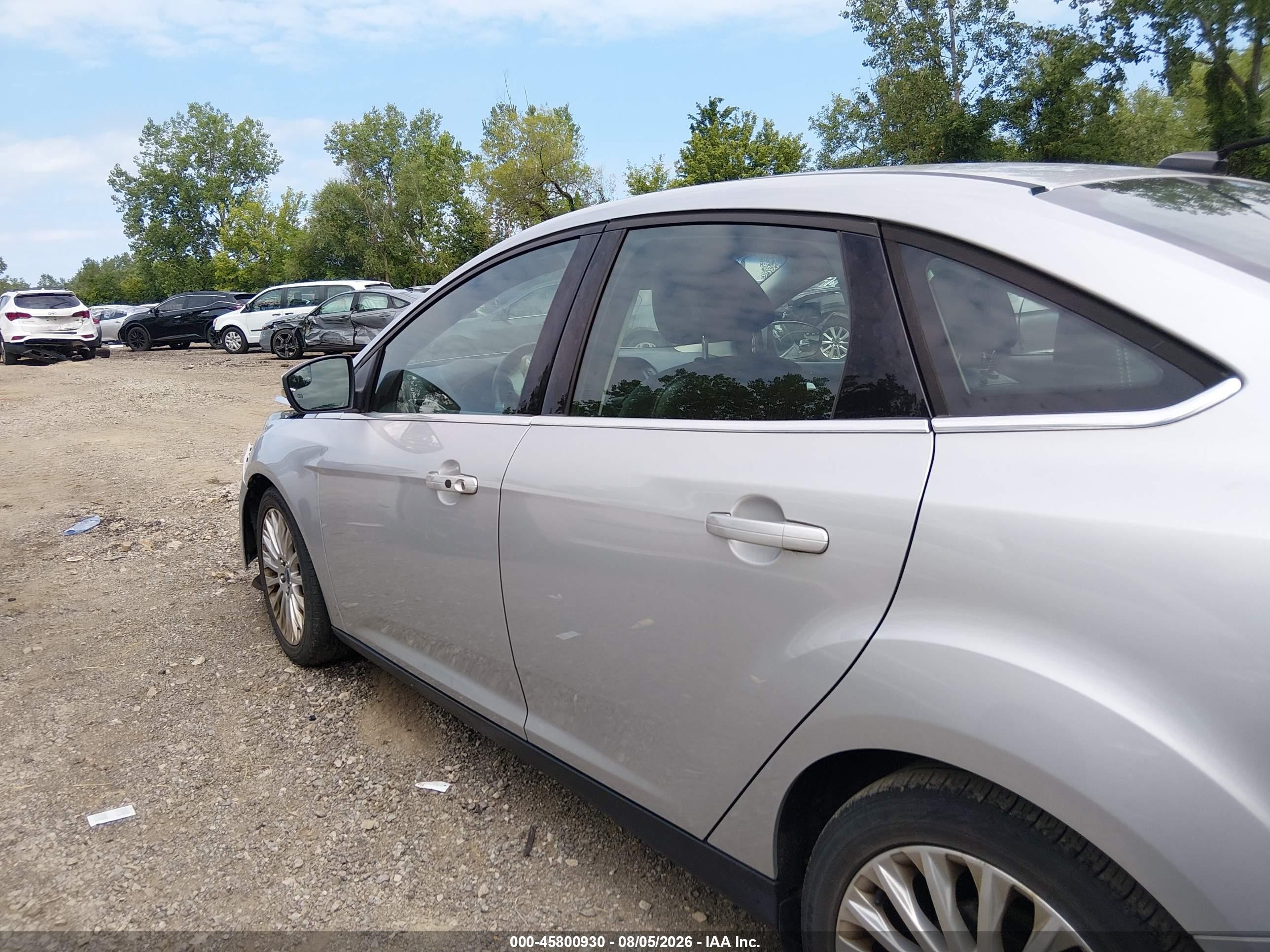 2012 Ford Focus Titanium Silver vin: 1FAHP3J26CL447750