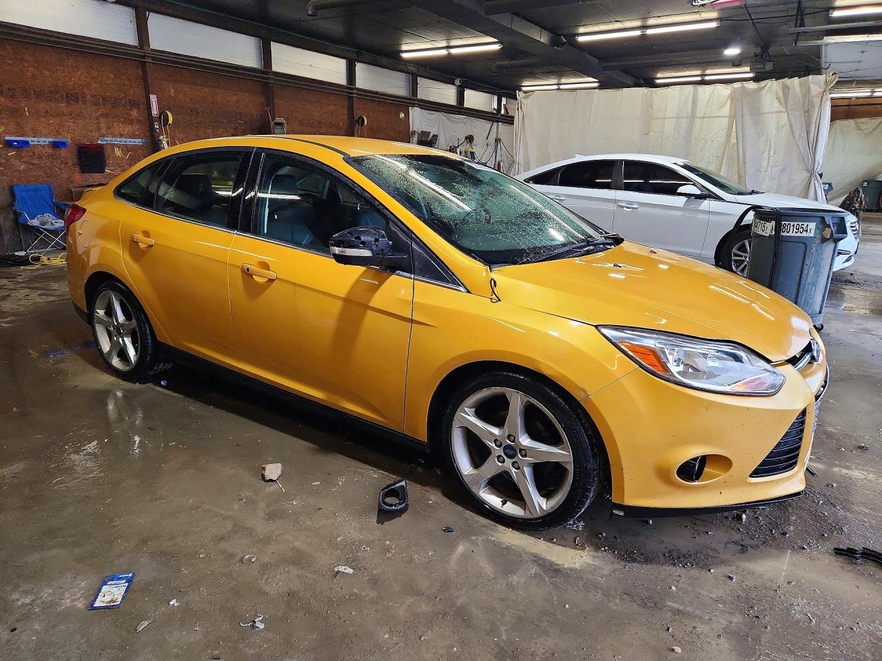 2012 Ford Focus Titanium Gold vin: 1FAHP3J28CL336214