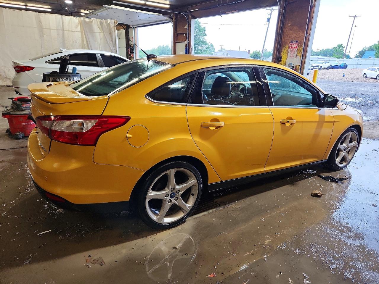 2012 Ford Focus Titanium Gold vin: 1FAHP3J28CL336214