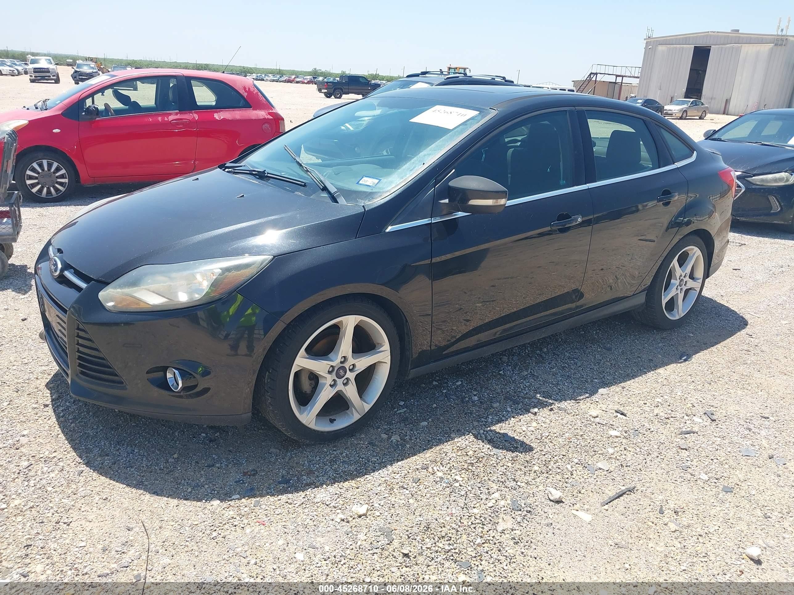 2012 Ford Focus Titanium Black vin: 1FAHP3J28CL352252