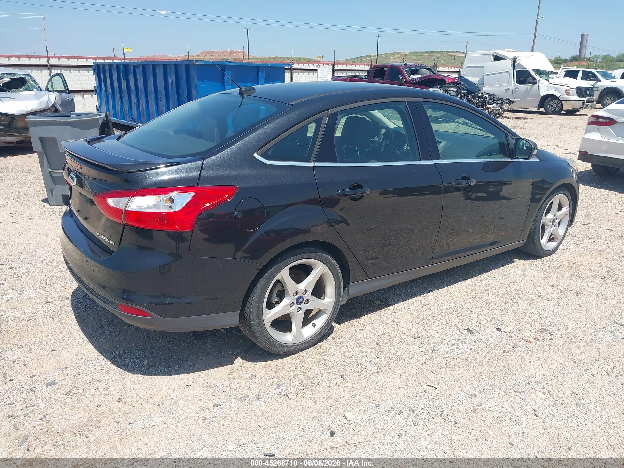2012 Ford Focus Titanium Black vin: 1FAHP3J28CL352252