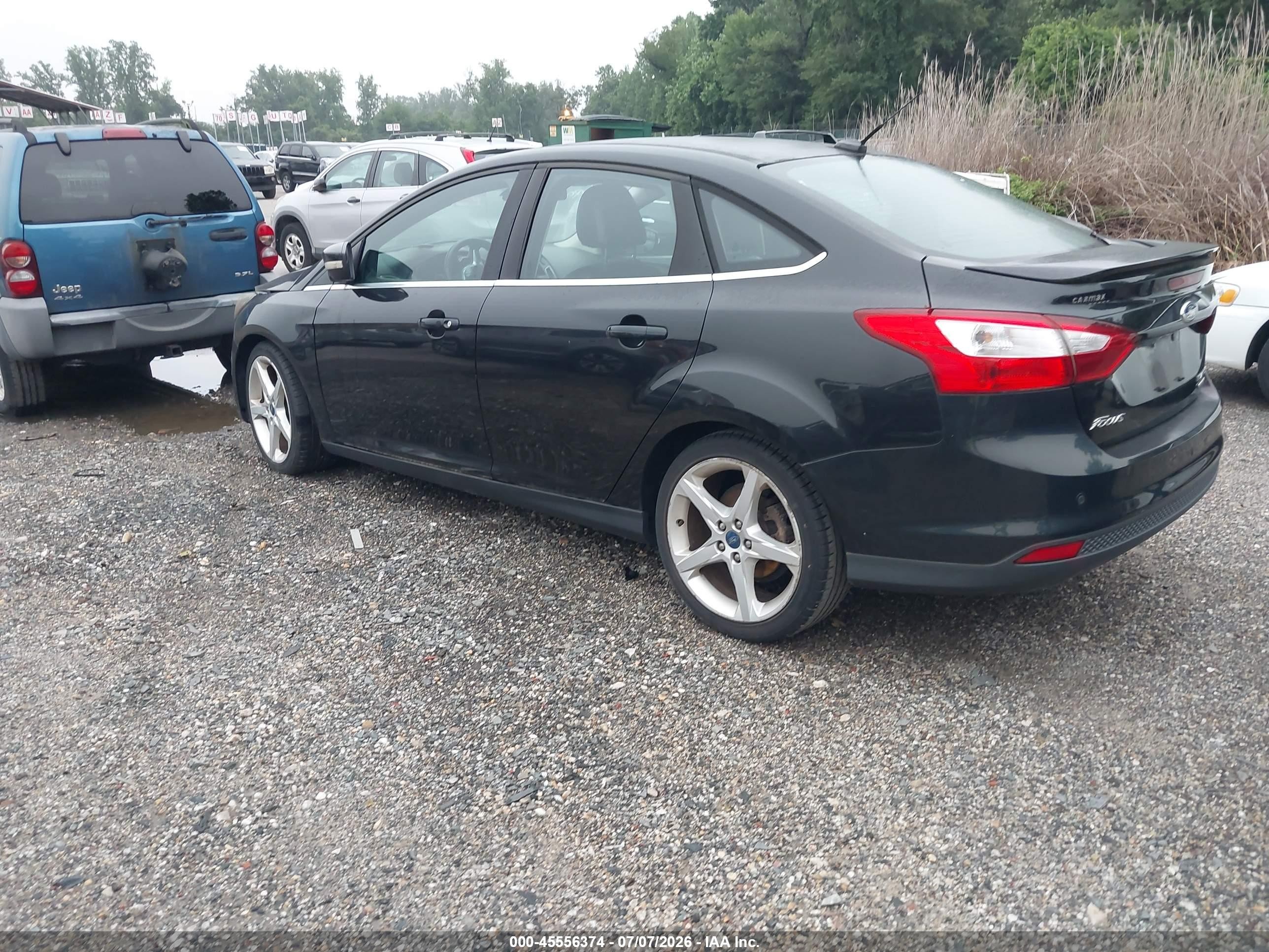 2012 Ford Focus Titanium Black vin: 1FAHP3J29CL390699
