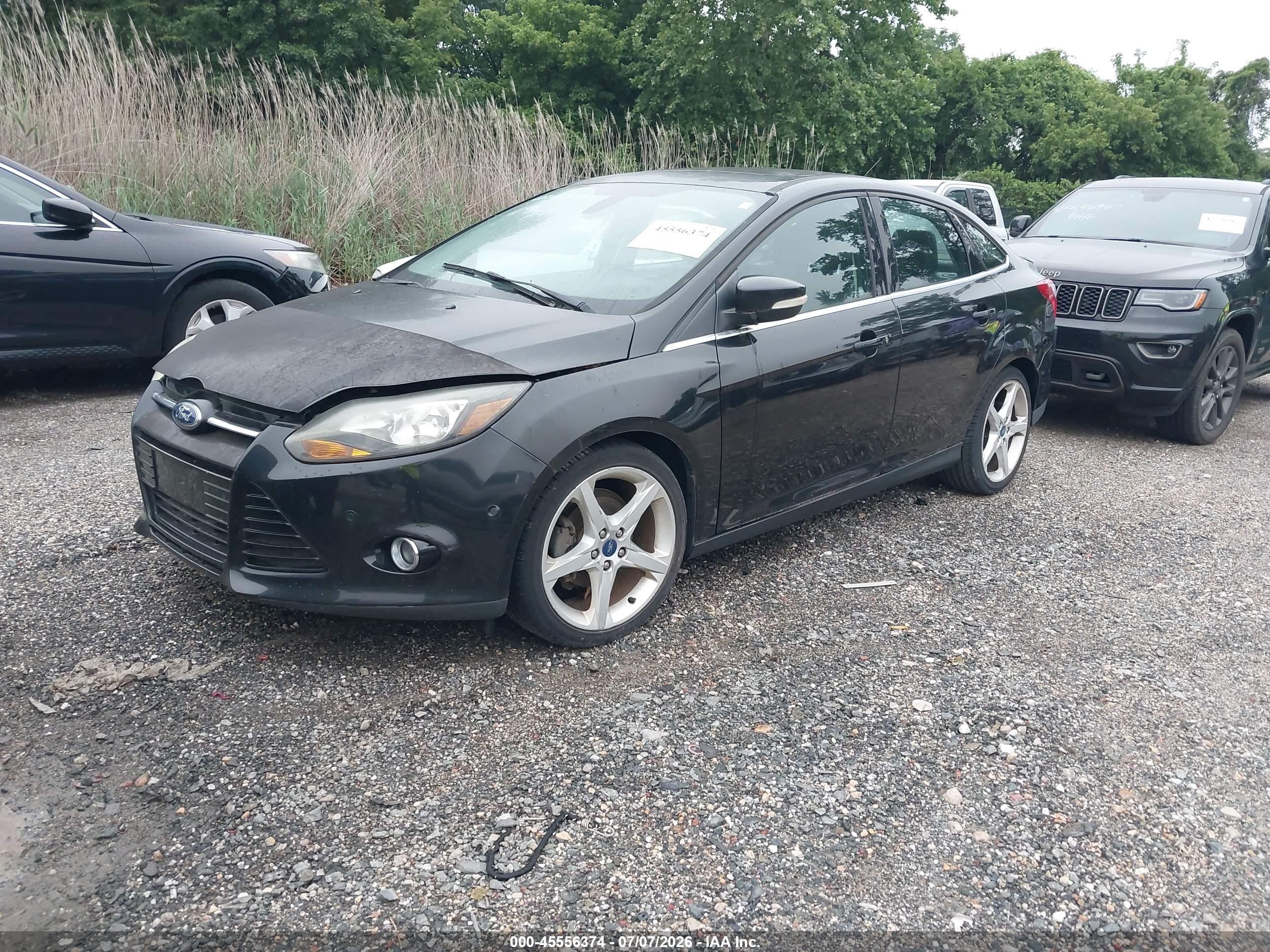 2012 Ford Focus Titanium Black vin: 1FAHP3J29CL390699